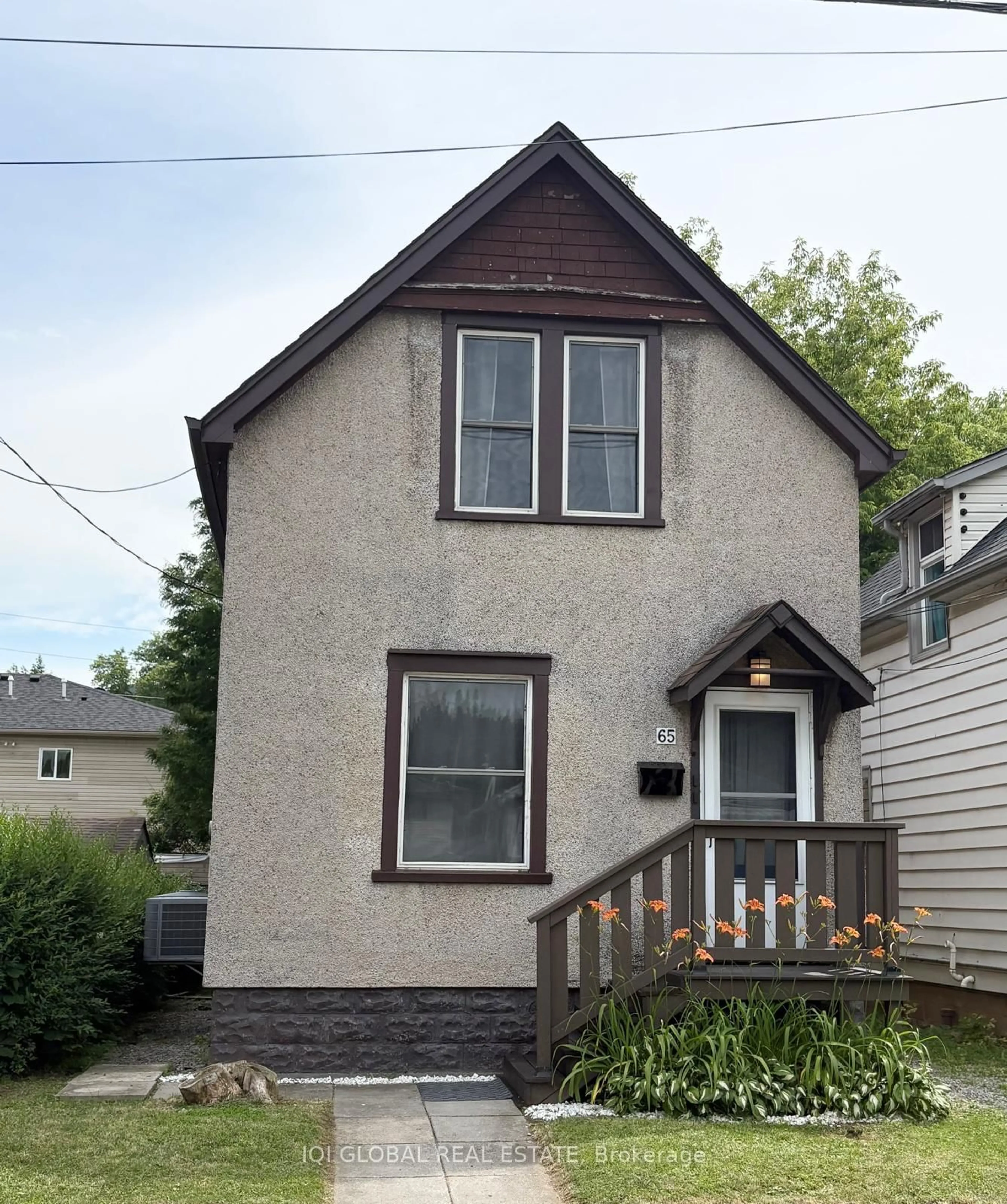Home with vinyl exterior material, street for 65 Holmes Ave, Hamilton Ontario L8S 2K8