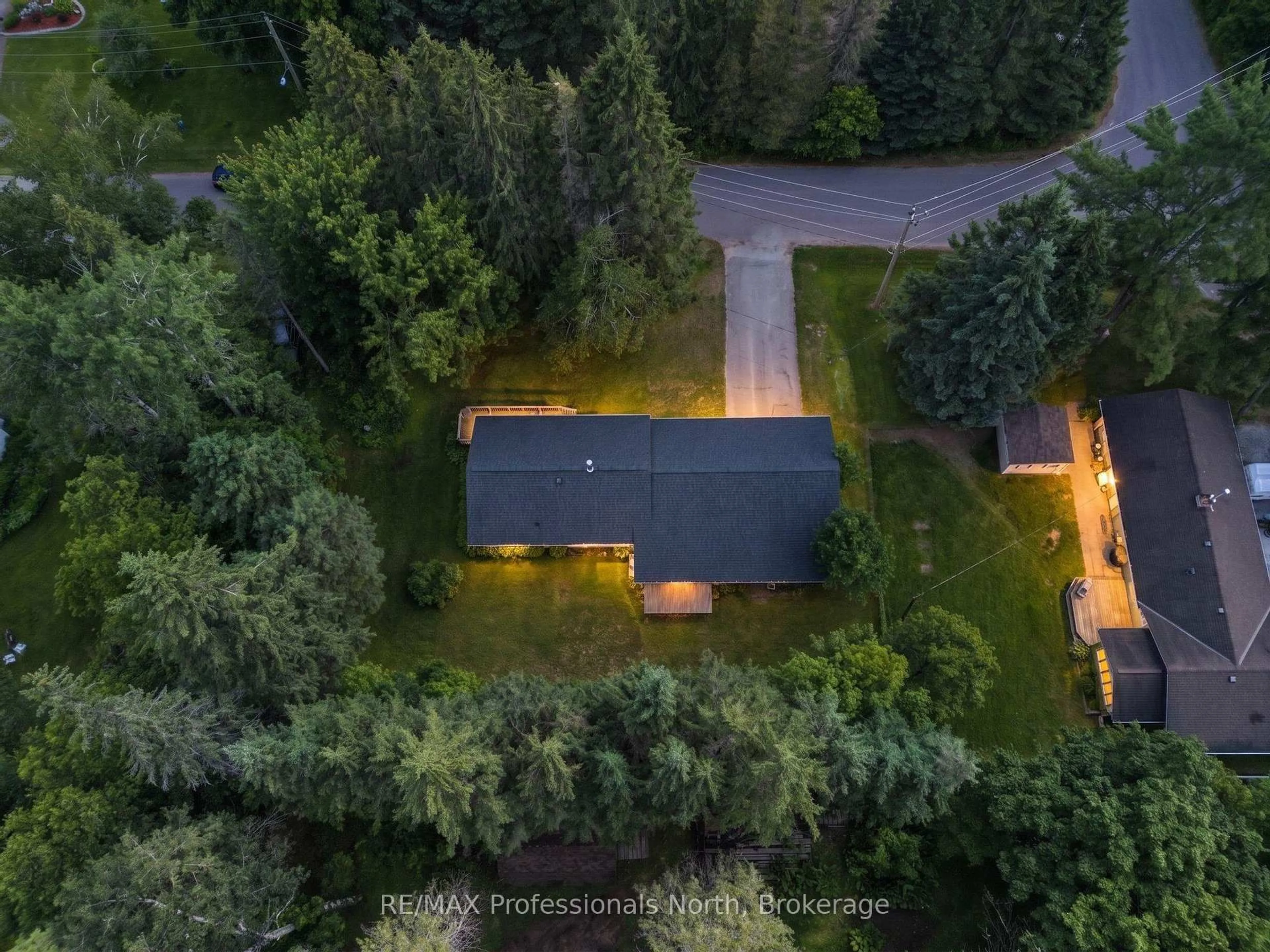 A pic from outside/outdoor area/front of a property/back of a property/a pic from drone, forest/trees view for 5 Stouffer St, Minden Hills Ontario K0M 2K0