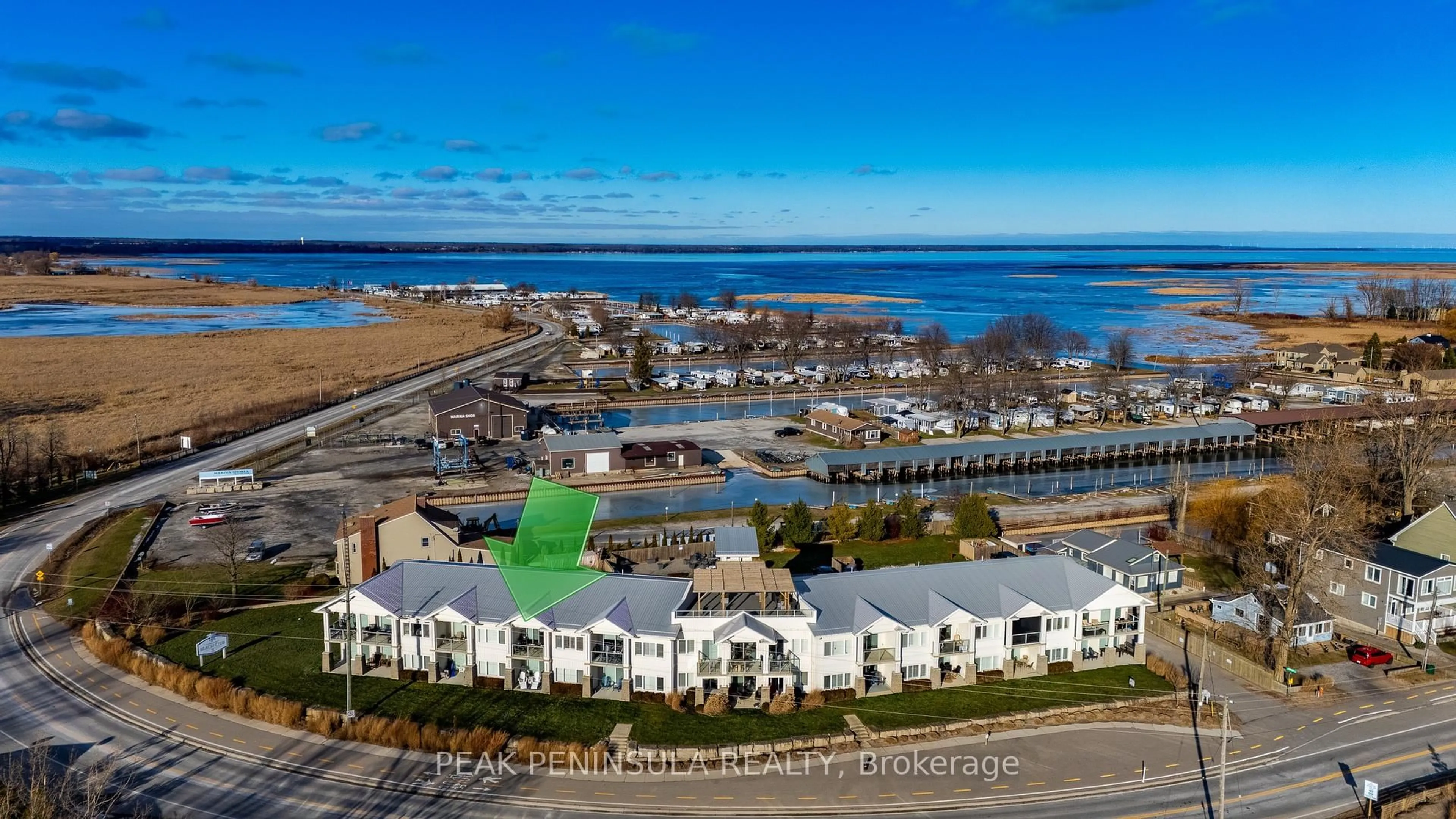 A pic from outside/outdoor area/front of a property/back of a property/a pic from drone, water/lake/river/ocean view for 12 Erie Blvd #203, Norfolk Ontario N0E 1M0