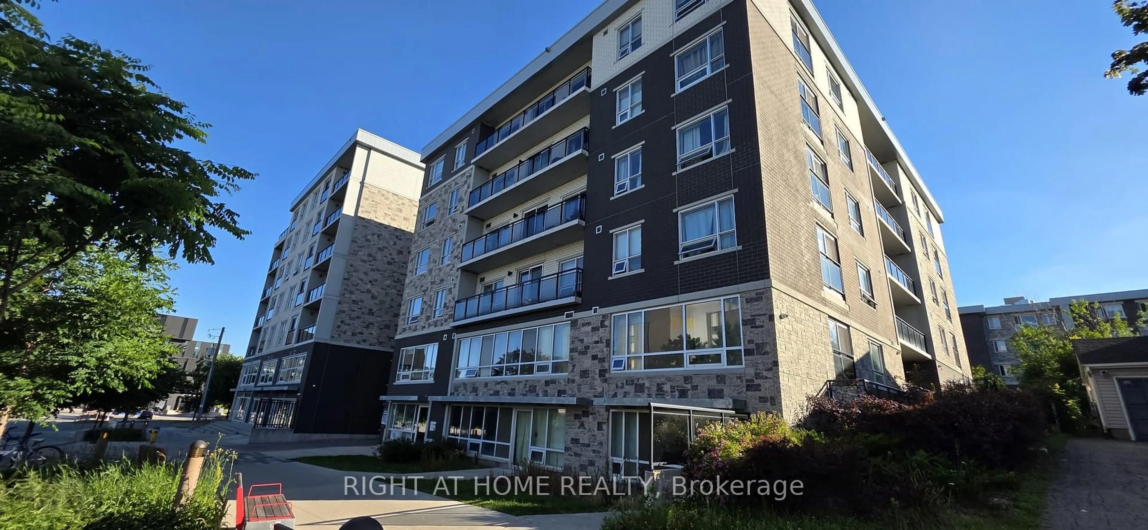 A pic from outside/outdoor area/front of a property/back of a property/a pic from drone, building for 275A Larch St #206, Waterloo Ontario N2L 0J1