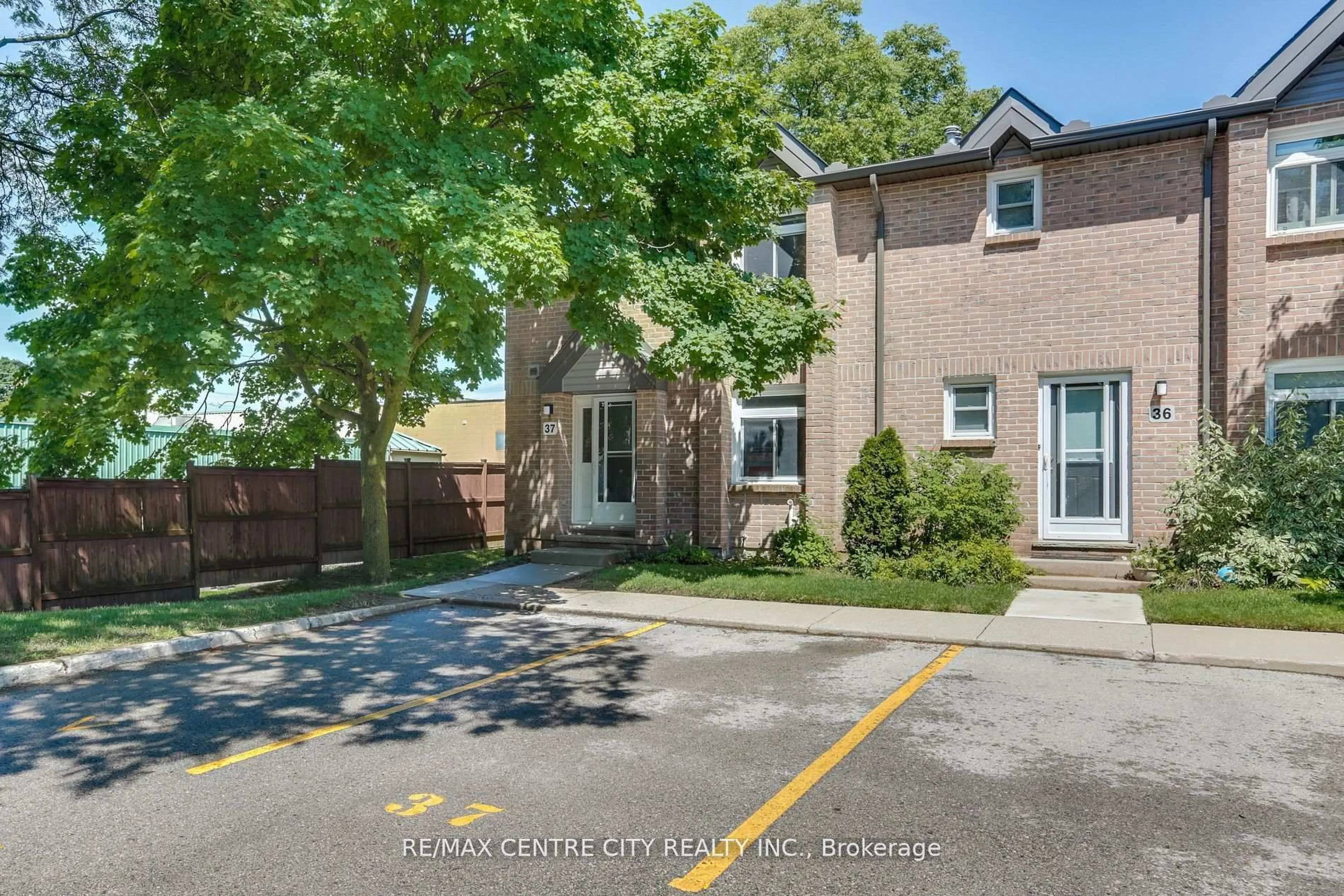 A pic from outside/outdoor area/front of a property/back of a property/a pic from drone, street for 1294 Byron Baseline Rd #37, London South Ontario N6K 4G8