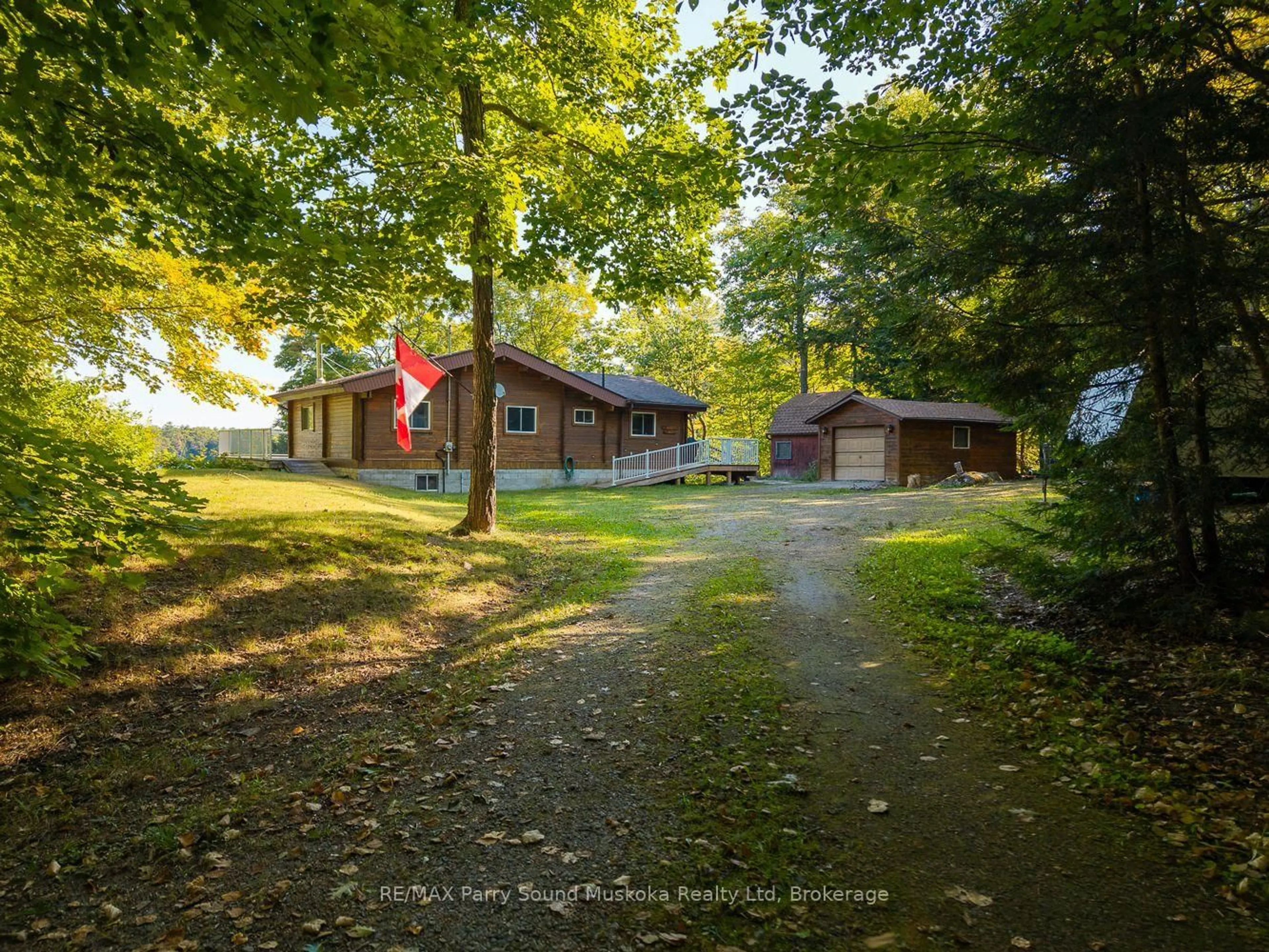 A pic from outside/outdoor area/front of a property/back of a property/a pic from drone, street for 30 Old Sids Rd, Seguin Ontario P2A 2W8