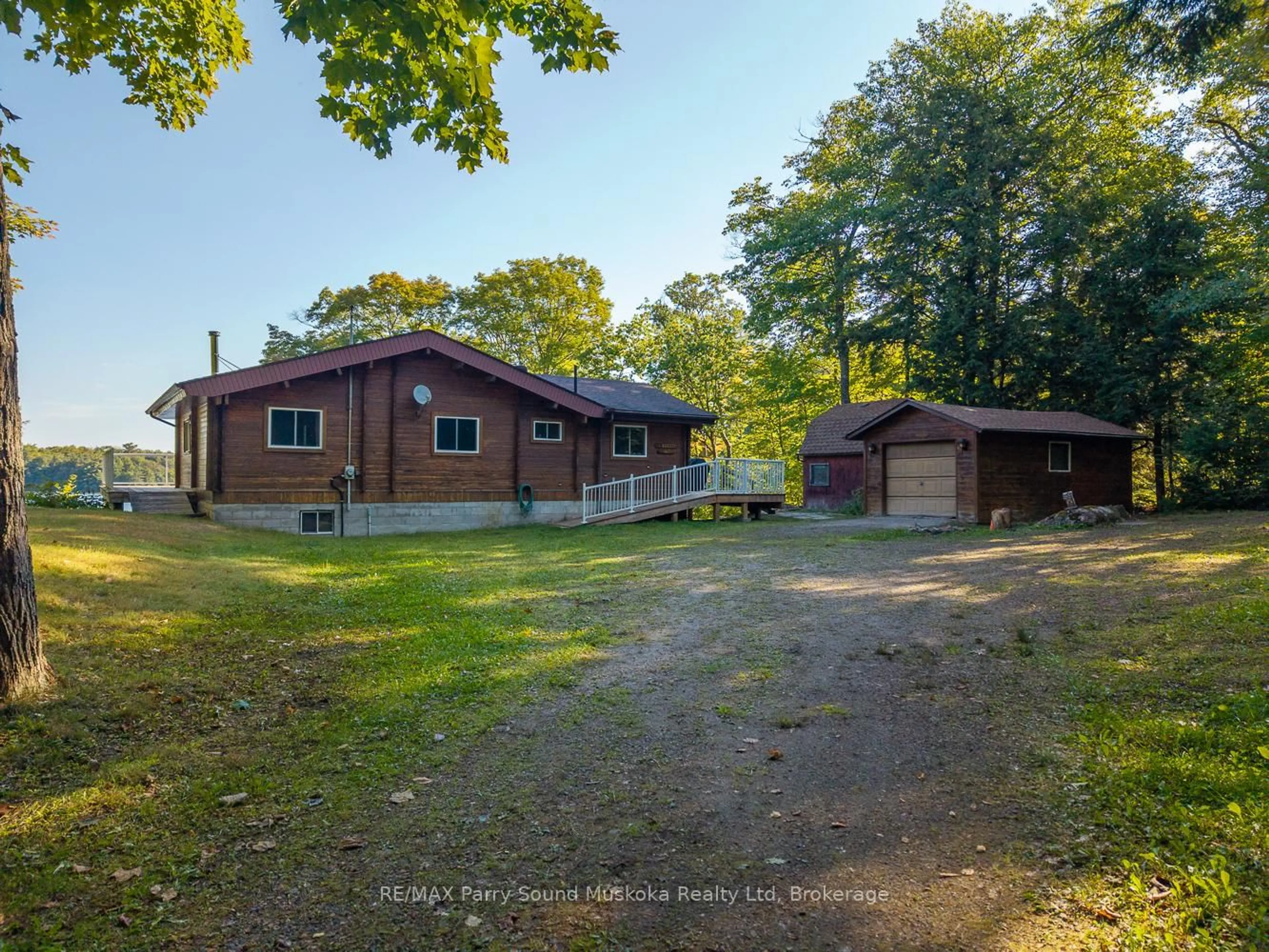 A pic from outside/outdoor area/front of a property/back of a property/a pic from drone, unknown for 30 Old Sids Rd, Seguin Ontario P2A 2W8