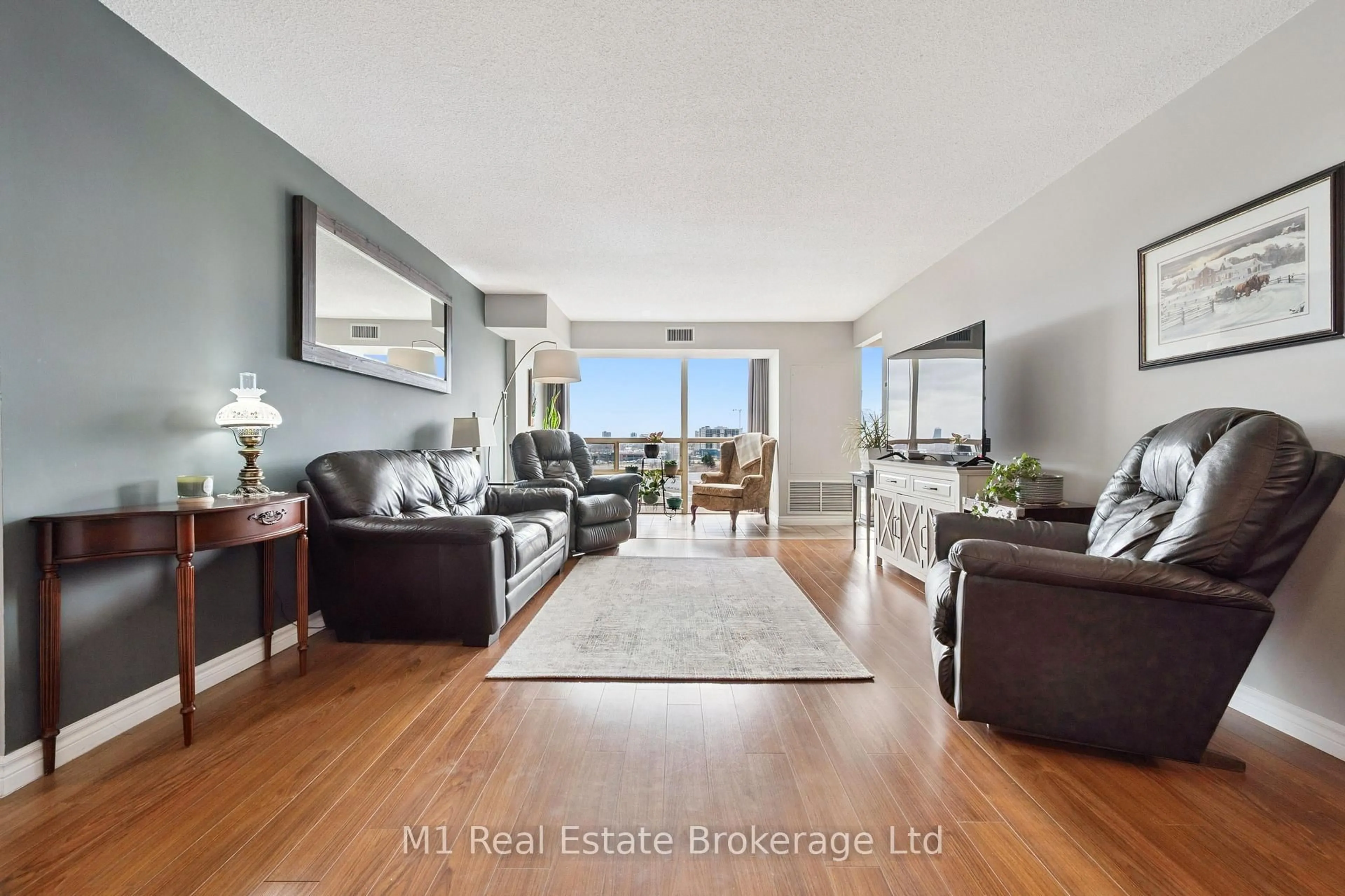 Living room with furniture, wood/laminate floor for 55 Blue Springs Dr #PH2, Waterloo Ontario N2J 4T3