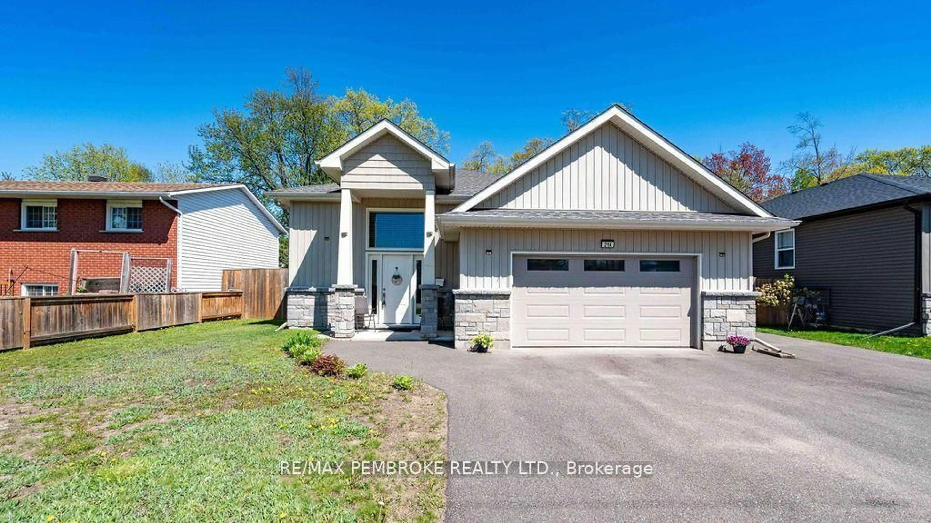 Home with vinyl exterior material, street for 21A East St, Petawawa Ontario K8H 2N7