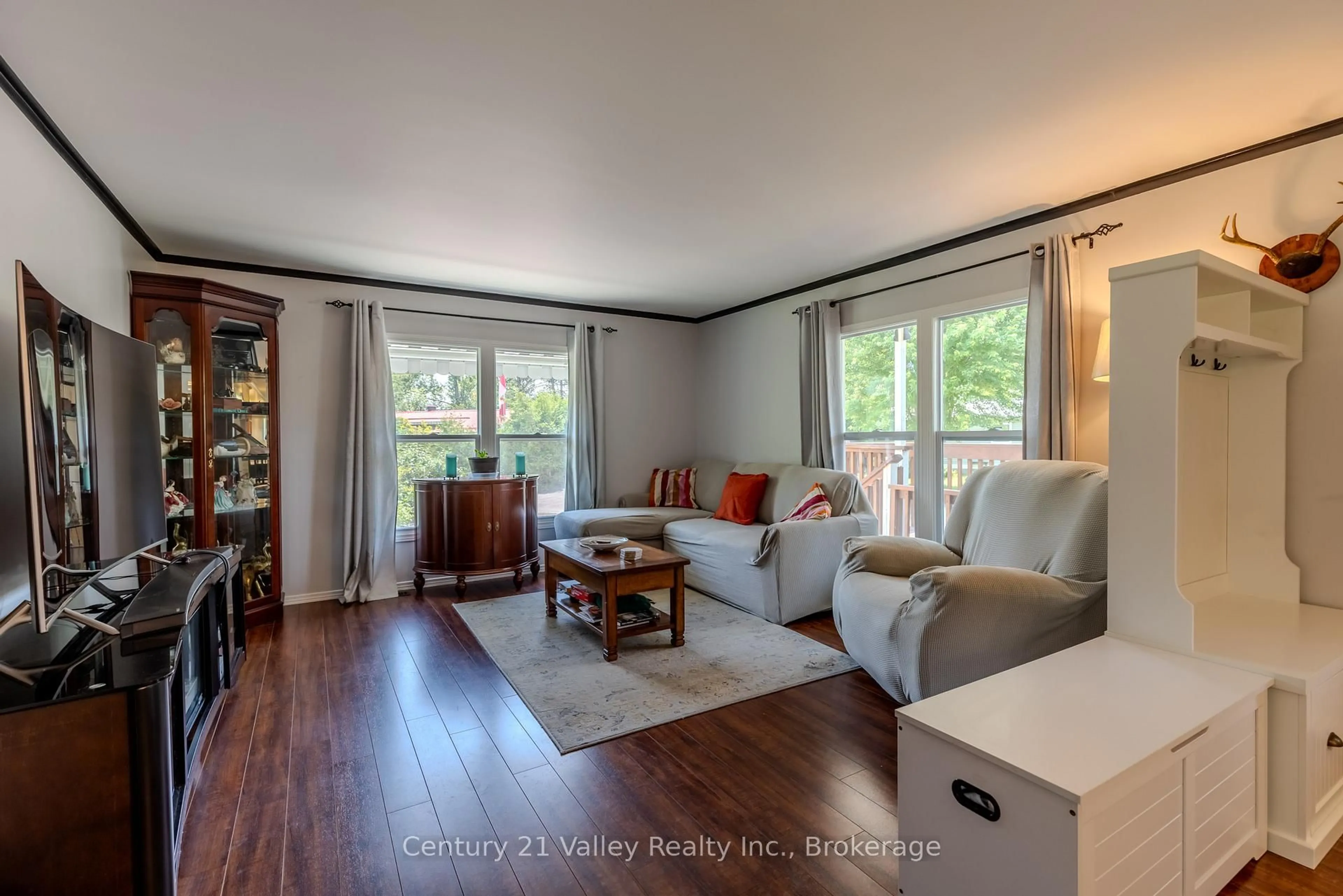 Living room with furniture, wood/laminate floor for 19 Robert Colin Lane, Cobden Ontario K0J 1K0