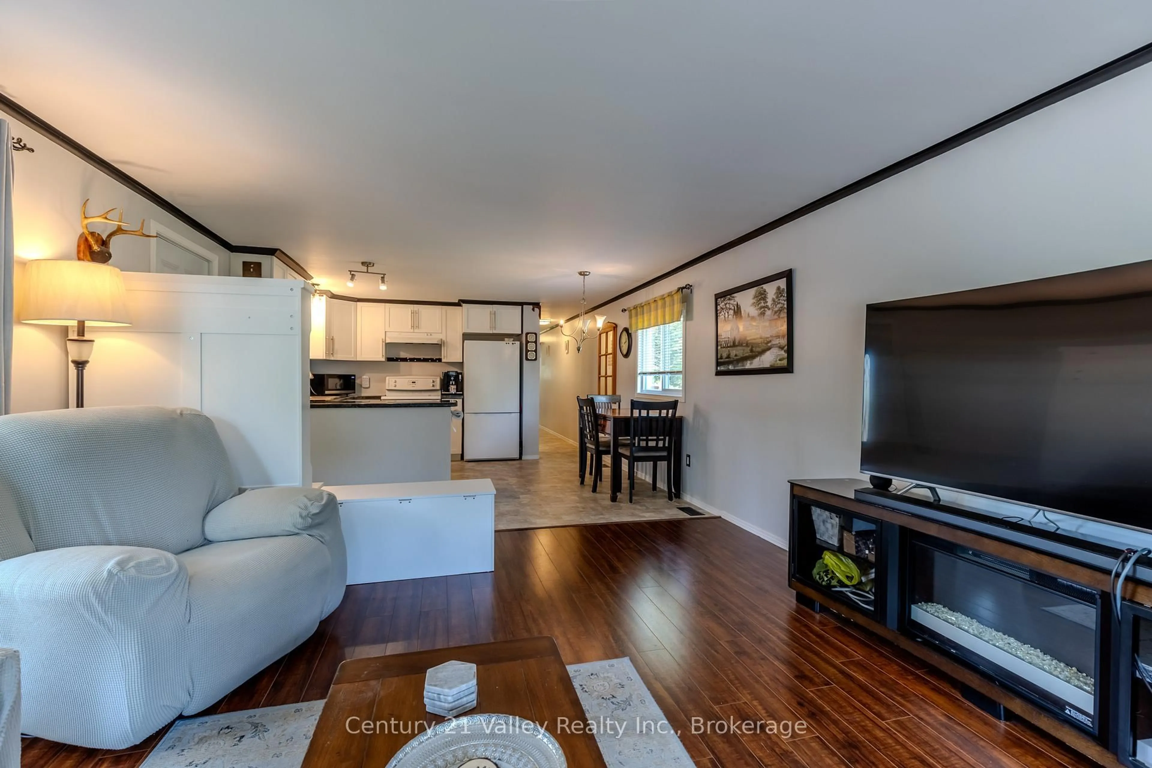 Living room with furniture, wood/laminate floor for 19 Robert Colin Lane, Cobden Ontario K0J 1K0