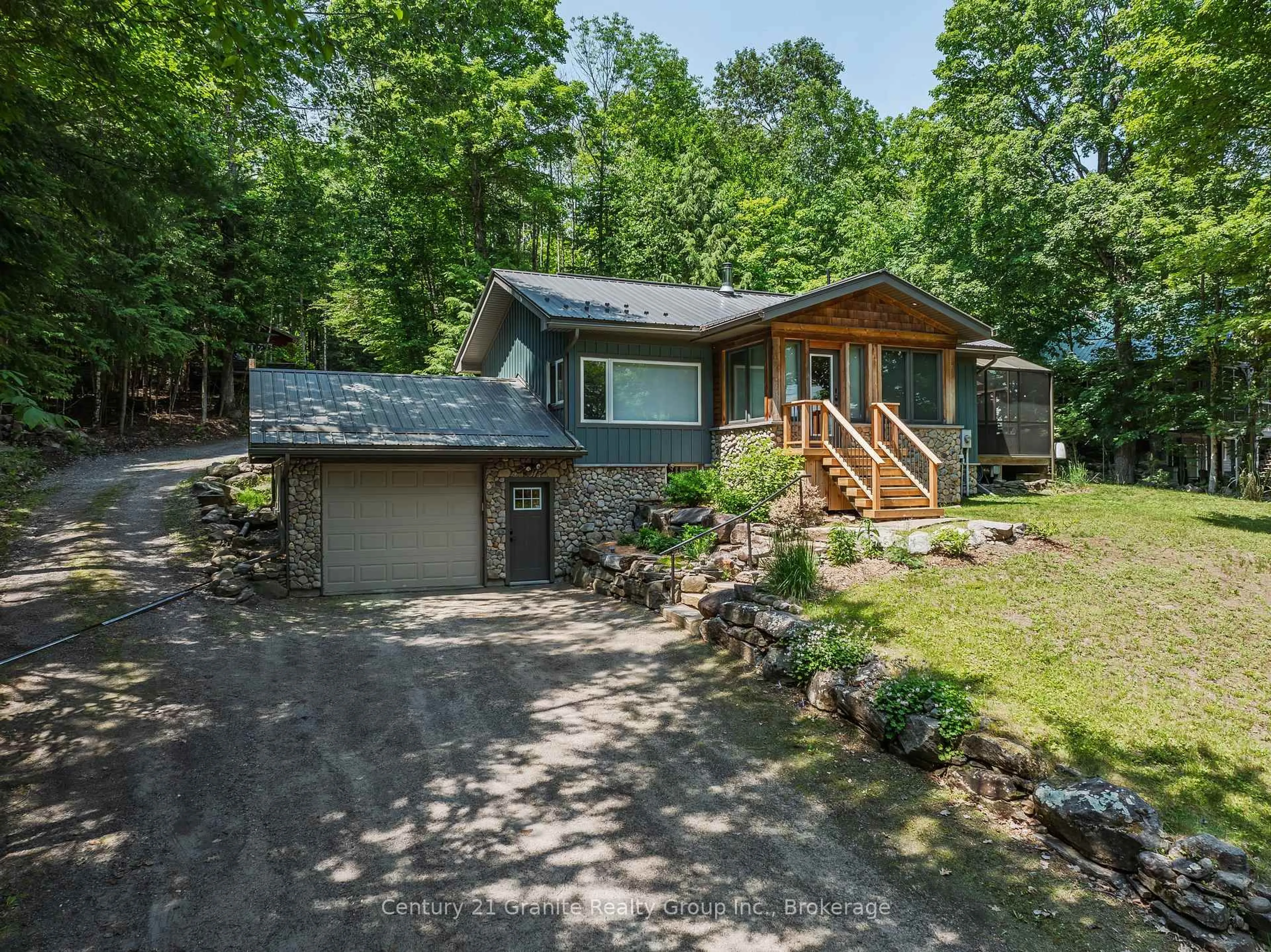 A pic from outside/outdoor area/front of a property/back of a property/a pic from drone, unknown for 1283 Wonderland Rd, Dysart et al Ontario K0M 1S0