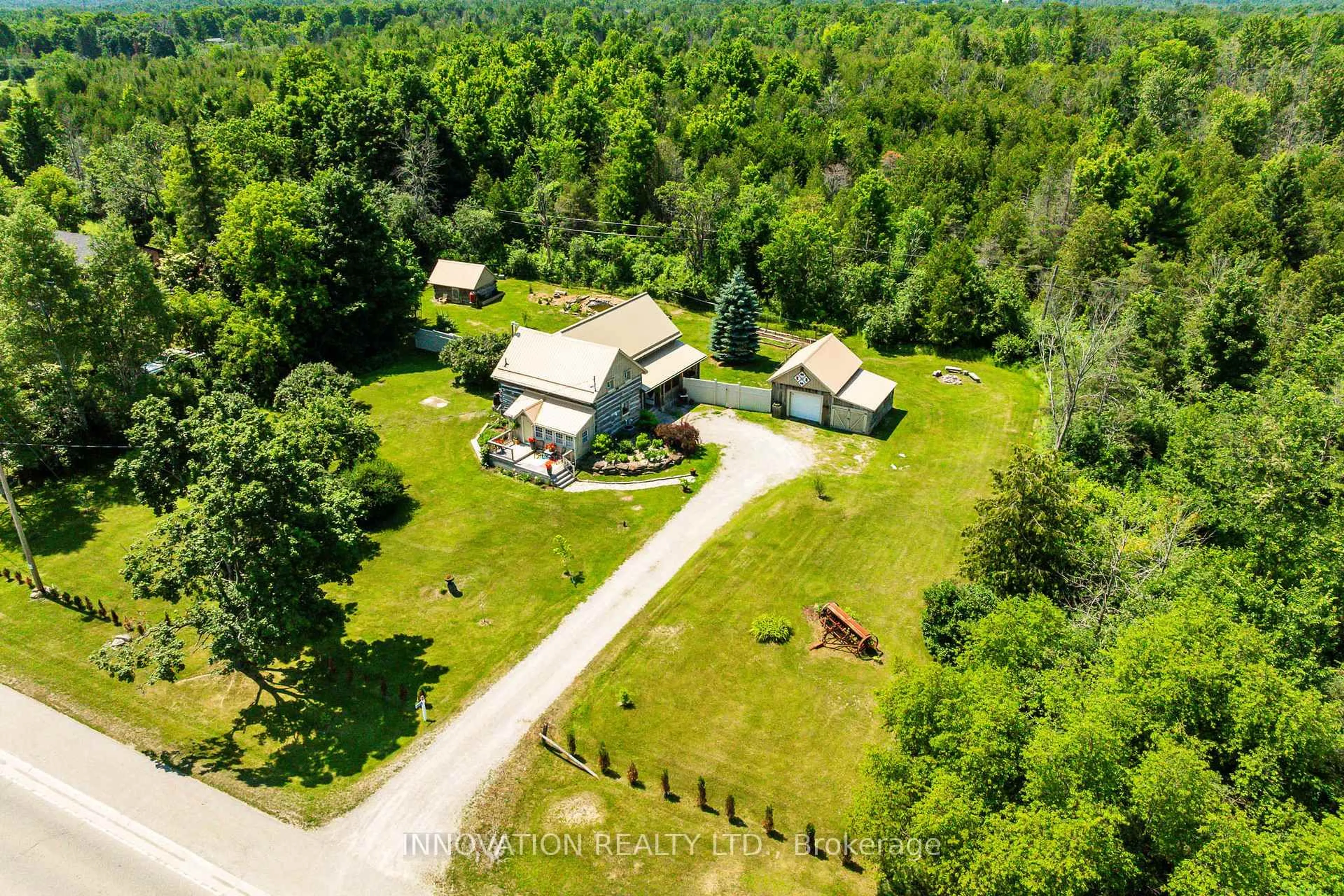 A pic from outside/outdoor area/front of a property/back of a property/a pic from drone, forest/trees view for 9585 15 Highway, Franktown Ontario K7A 0K3