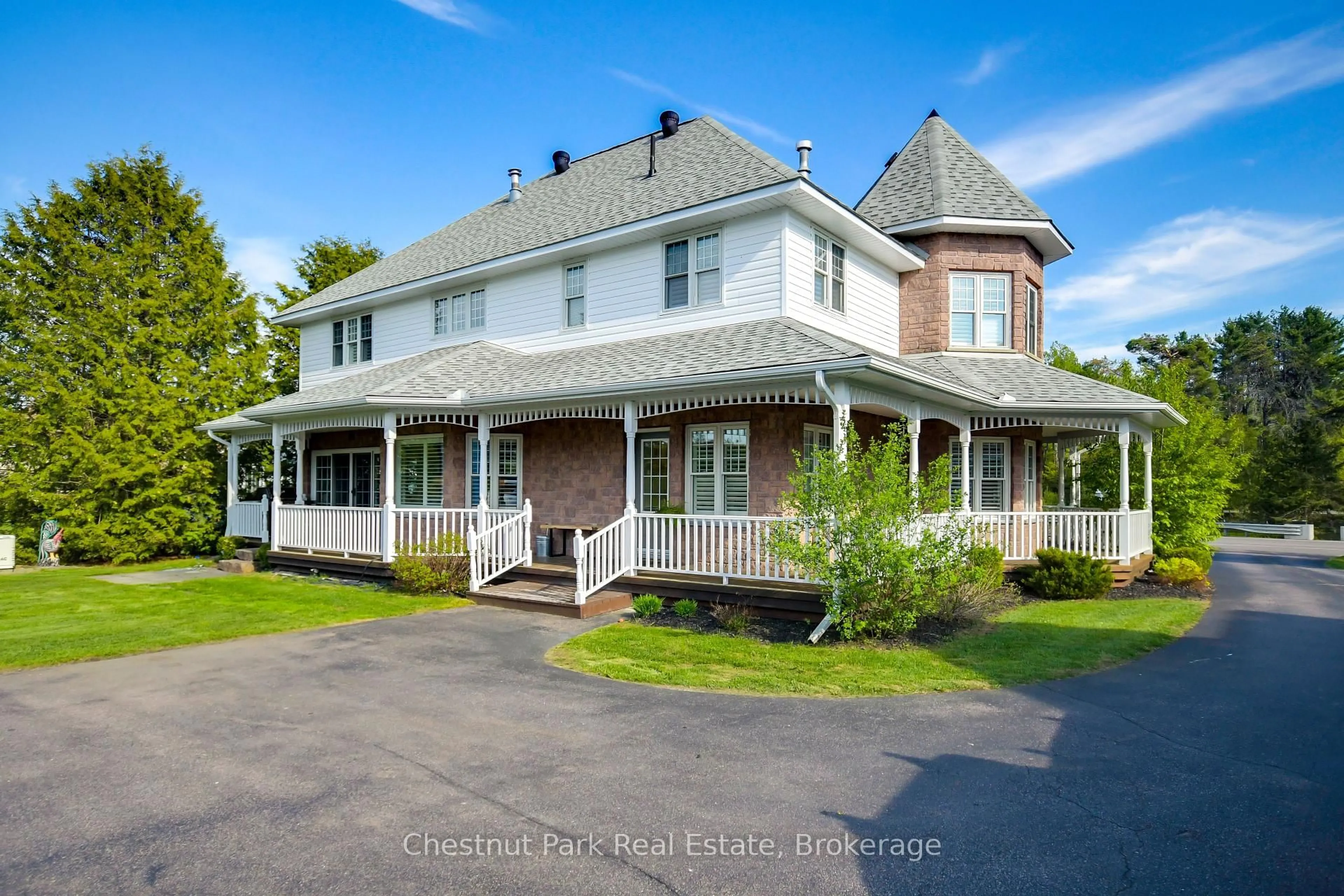 A pic from outside/outdoor area/front of a property/back of a property/a pic from drone, street for 279 Santas Village Rd, Bracebridge Ontario P1L 1W8
