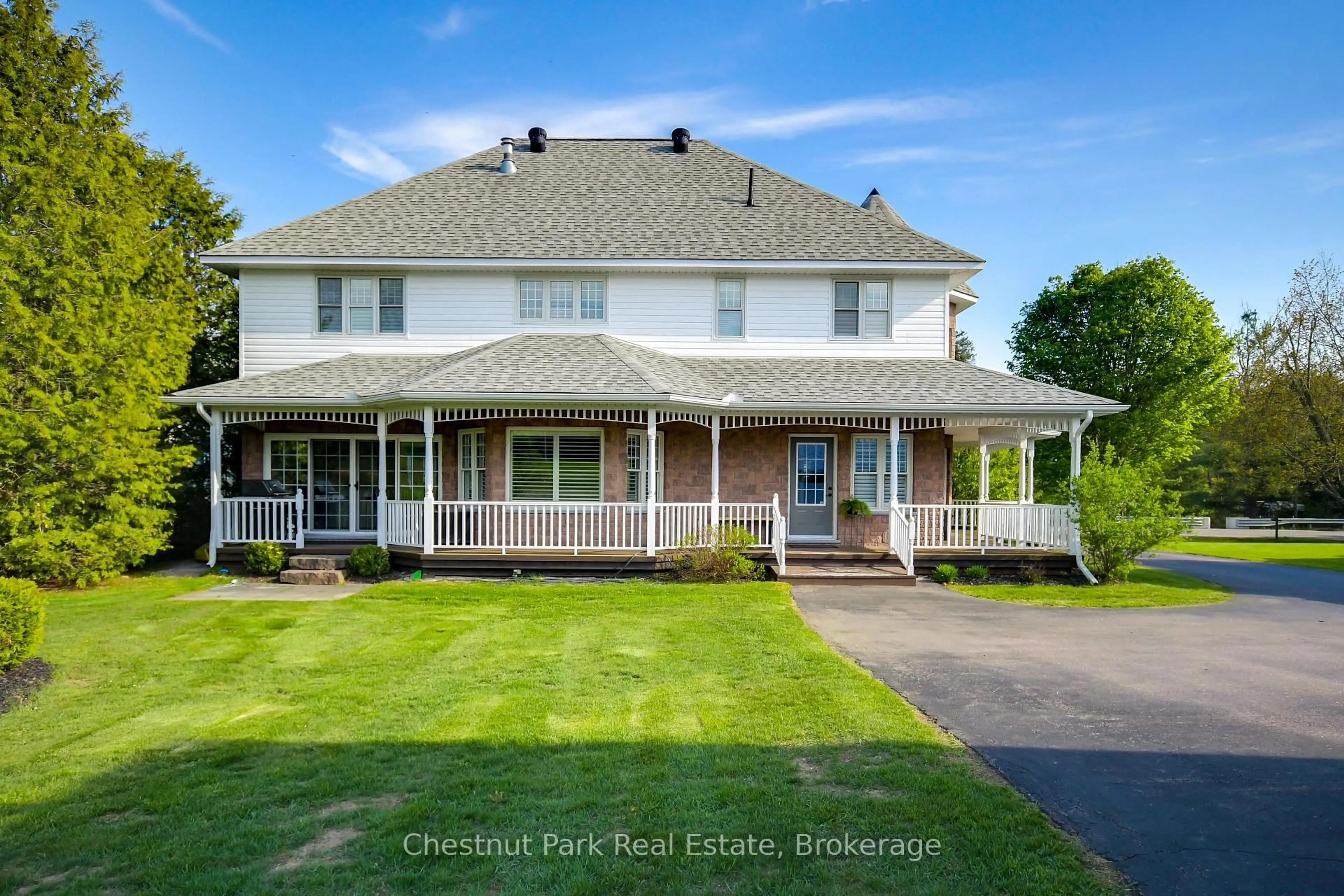 A pic from outside/outdoor area/front of a property/back of a property/a pic from drone, street for 279 Santas Village Rd, Bracebridge Ontario P1L 1W8