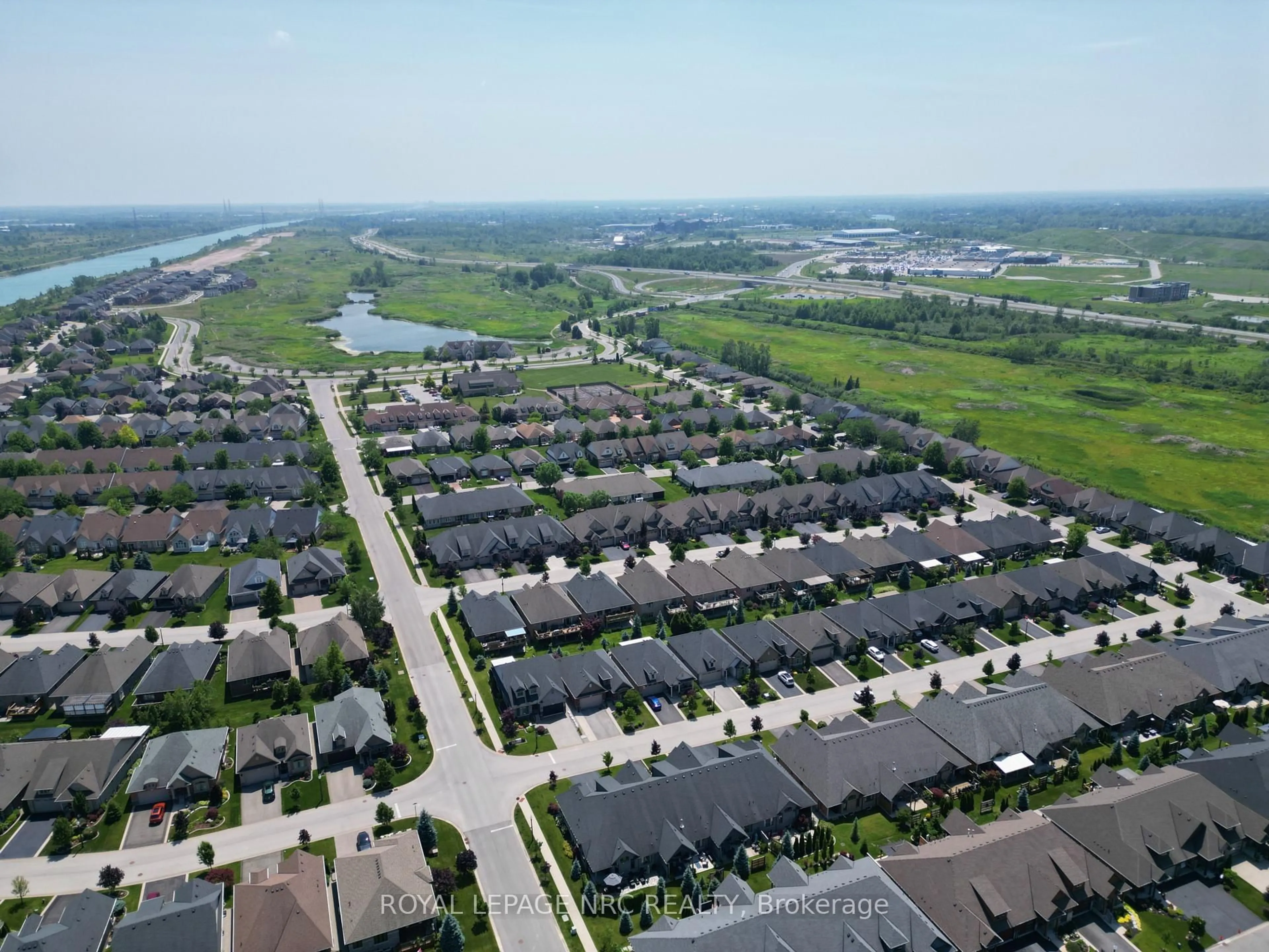 A pic from outside/outdoor area/front of a property/back of a property/a pic from drone, street for 53 Carrick Tr, Welland Ontario L3B 0E7