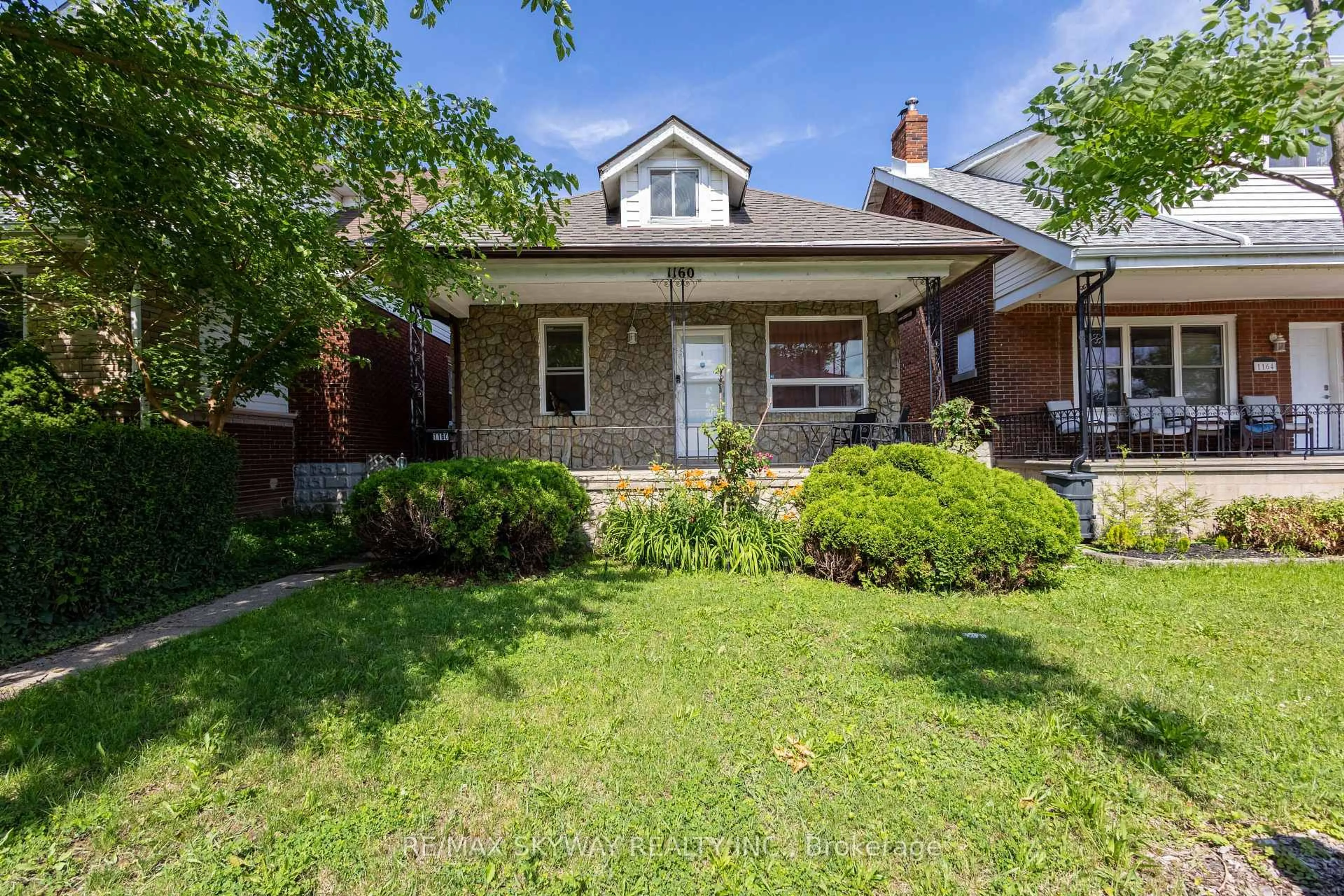 Home with brick exterior material, street for 1160 Elm Ave, Windsor Ontario N9A 5H9