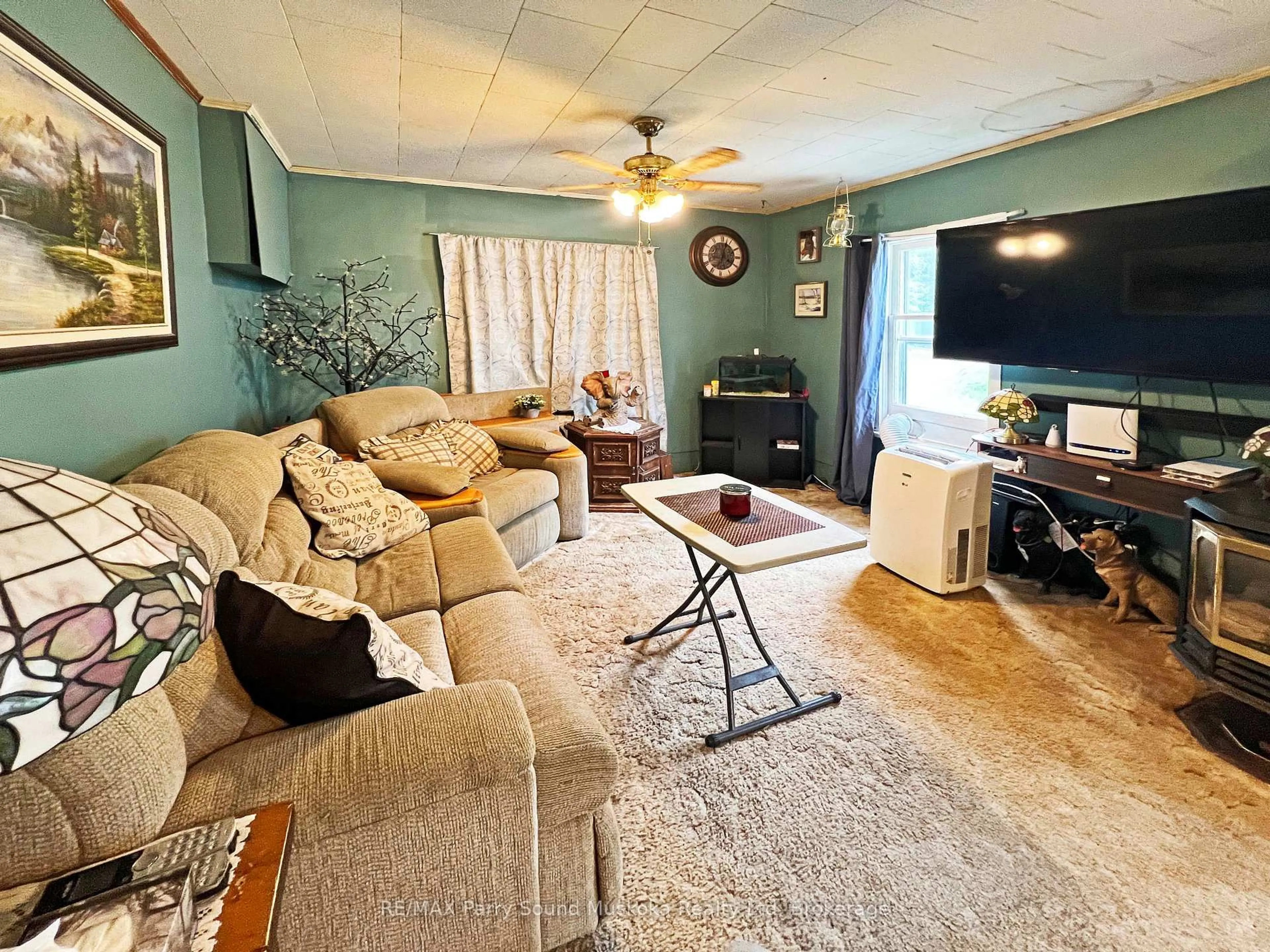Living room with furniture, unknown for 11 Adelaide St, Parry Sound Ontario P2A 1H2
