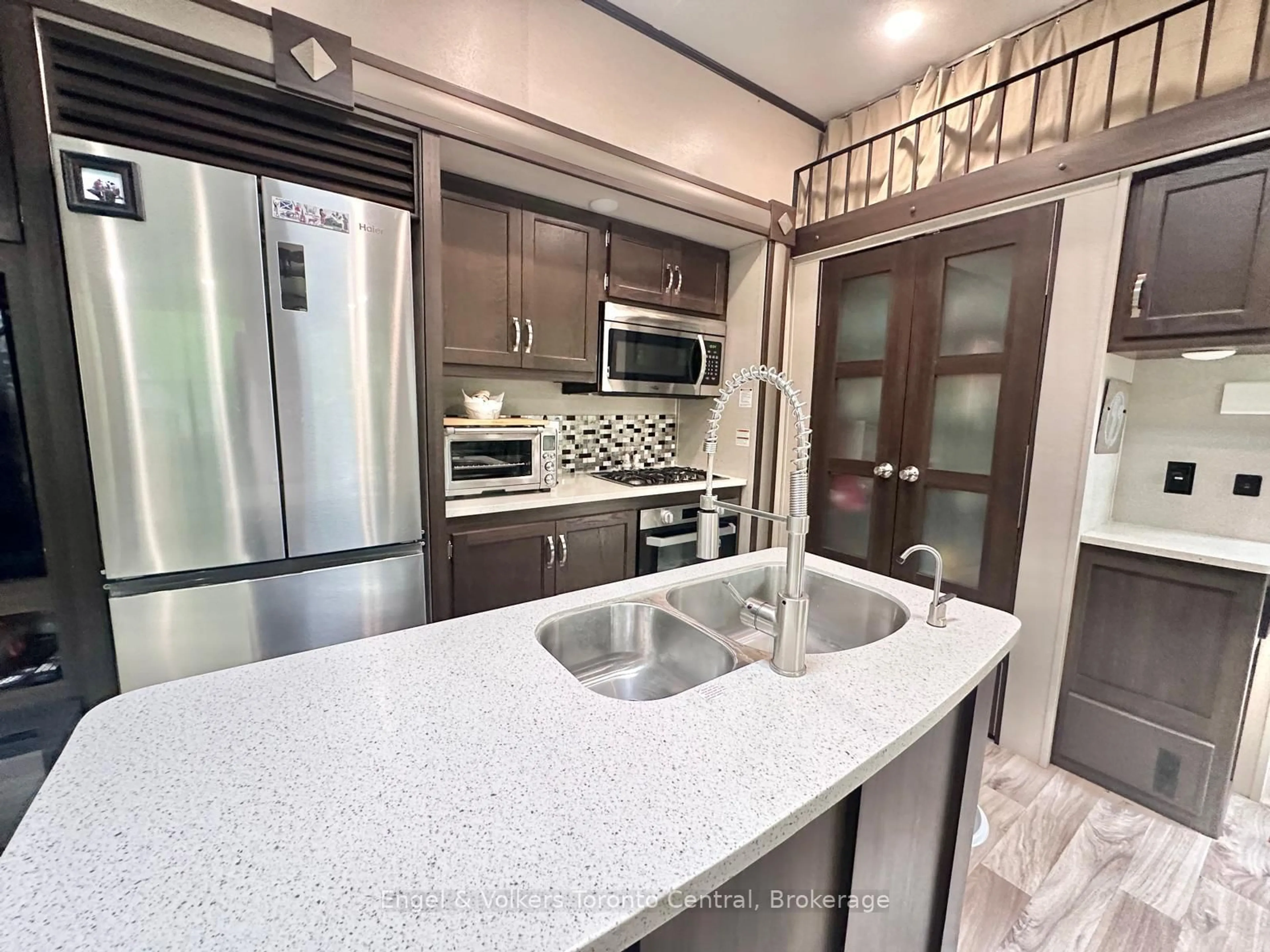 Open concept kitchen, ceramic/tile floor for 7489 SIDEROAD 5. #H 28, Wellington North Ontario N0G 2L0