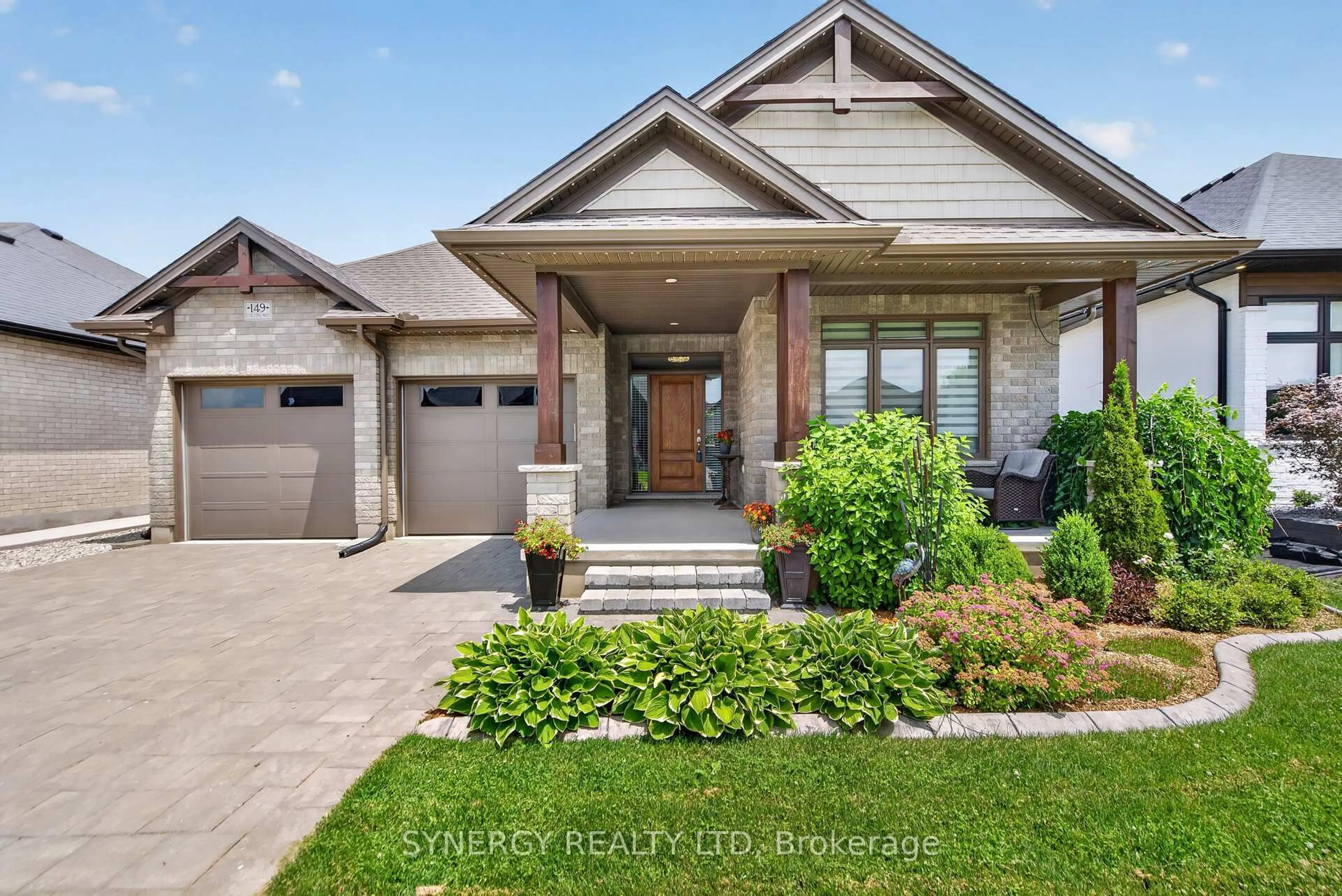 Home with brick exterior material, street for 149 Collins Way, Strathroy-Caradoc Ontario N7G 0G2