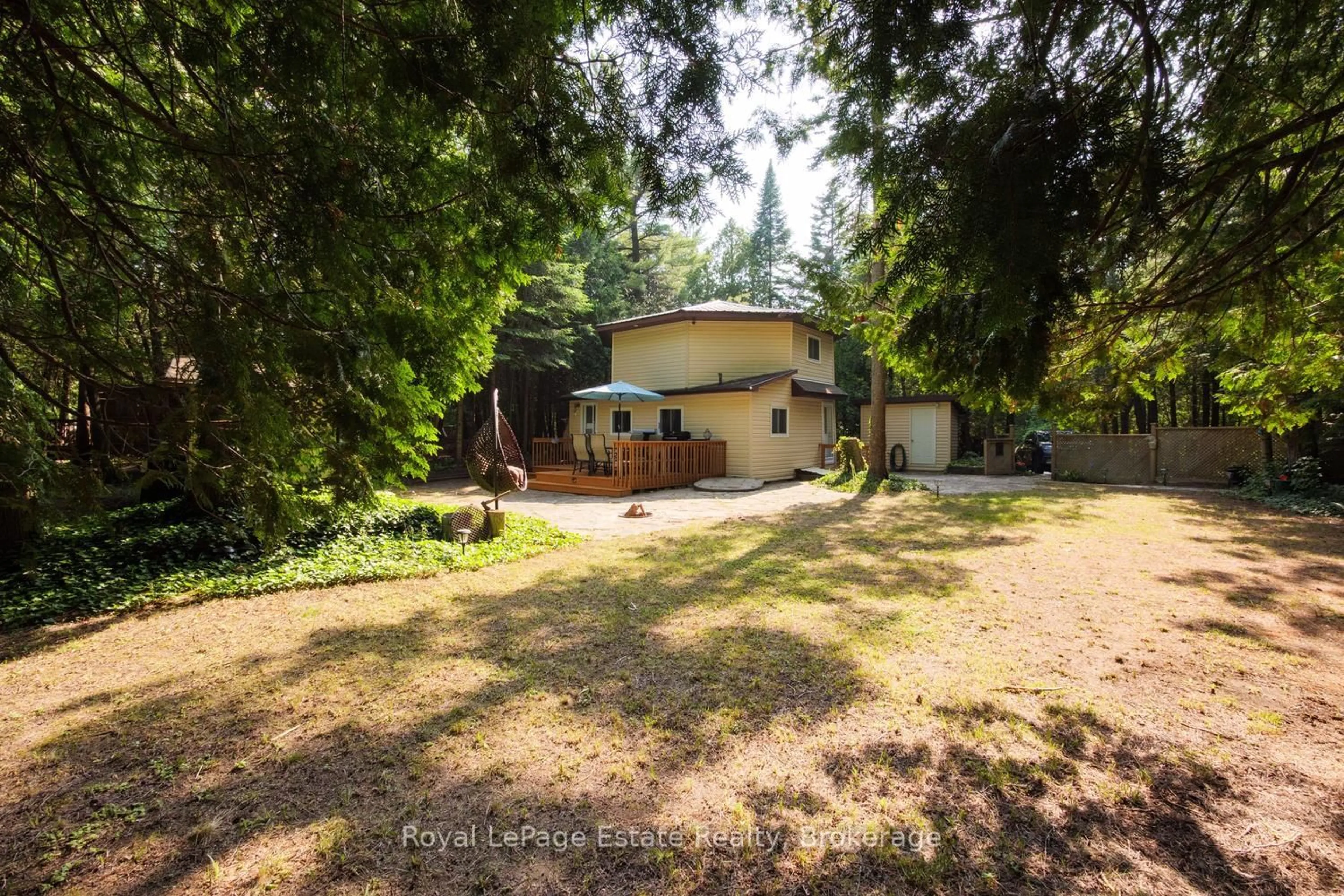 A pic from outside/outdoor area/front of a property/back of a property/a pic from drone, forest/trees view for 125 Third Ave, South Bruce Peninsula Ontario N0H 2G0