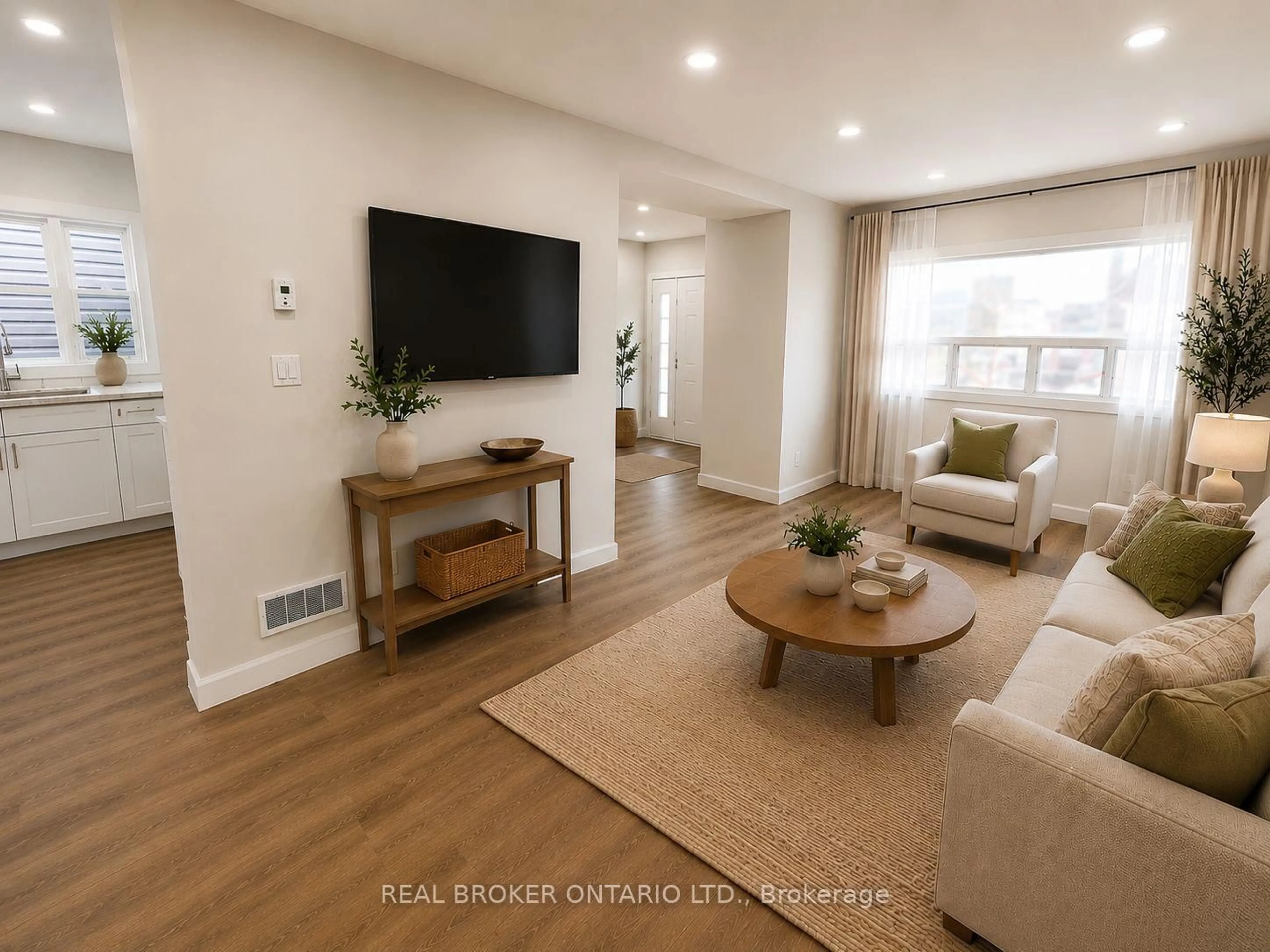 Living room with furniture, wood/laminate floor for 5 Rowanwood St, Hamilton Ontario L8L 7H1