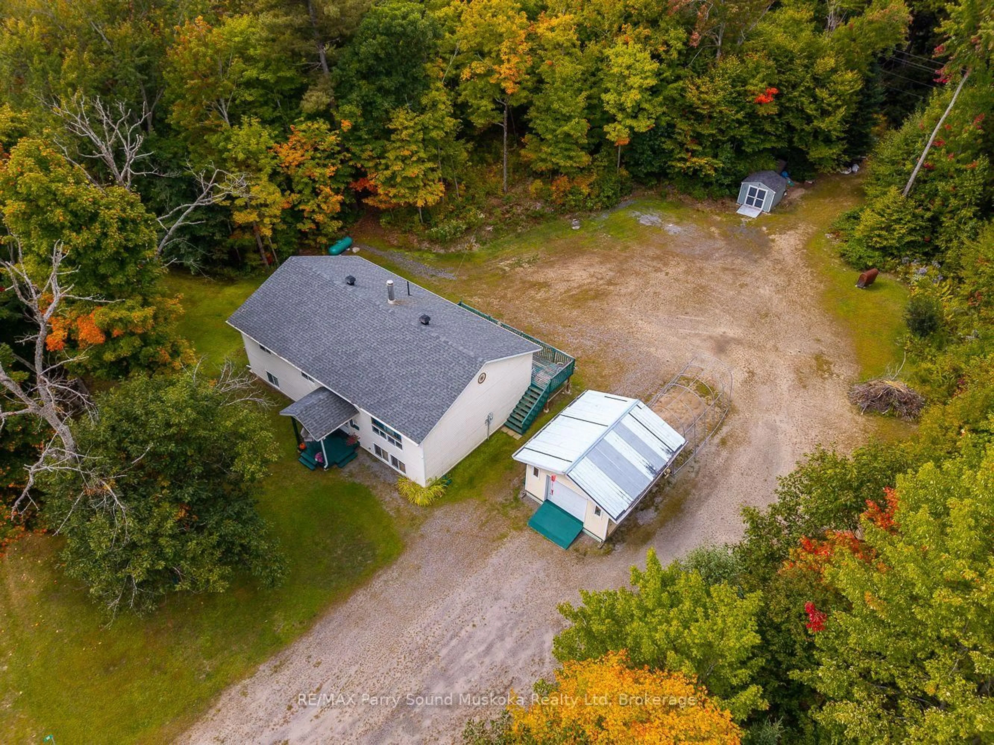 A pic from outside/outdoor area/front of a property/back of a property/a pic from drone, unknown for 59 Black Rd, Seguin Ontario P2A 2W8