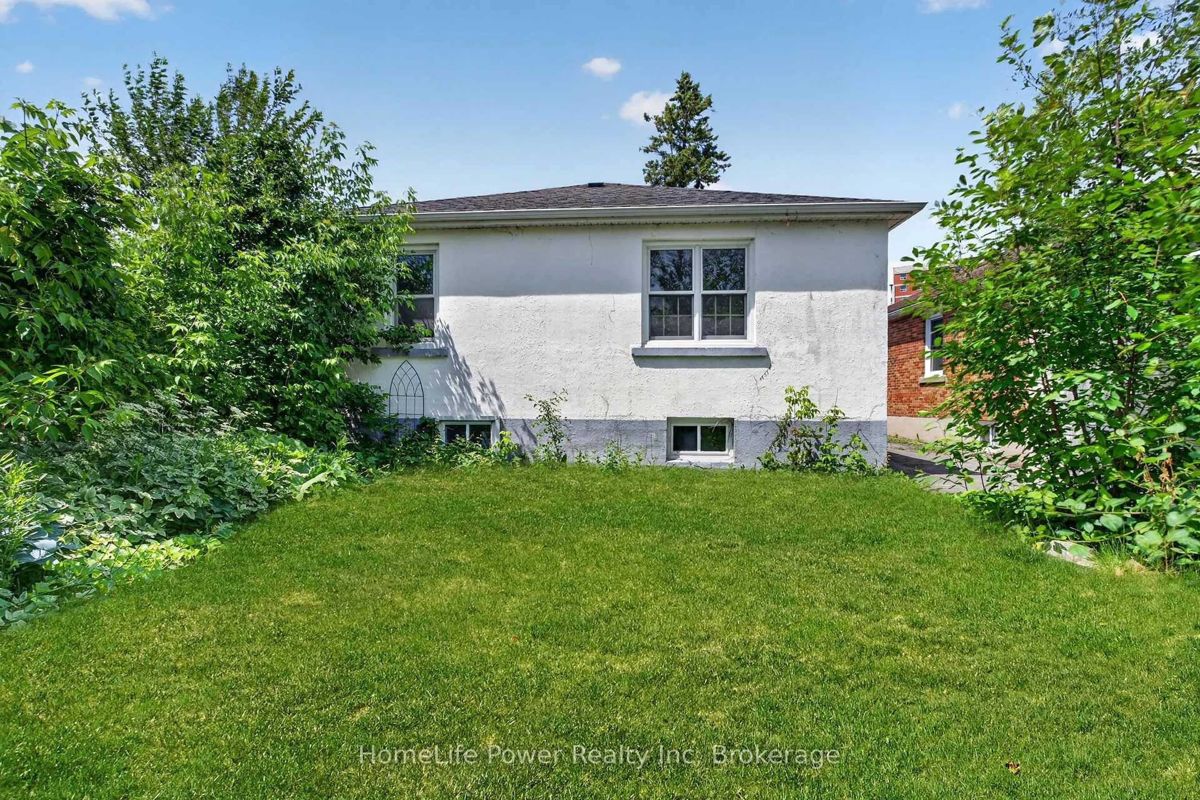 A pic from outside/outdoor area/front of a property/back of a property/a pic from drone, street for 32 Dunlop St, Kingston Ontario K7L 1L2