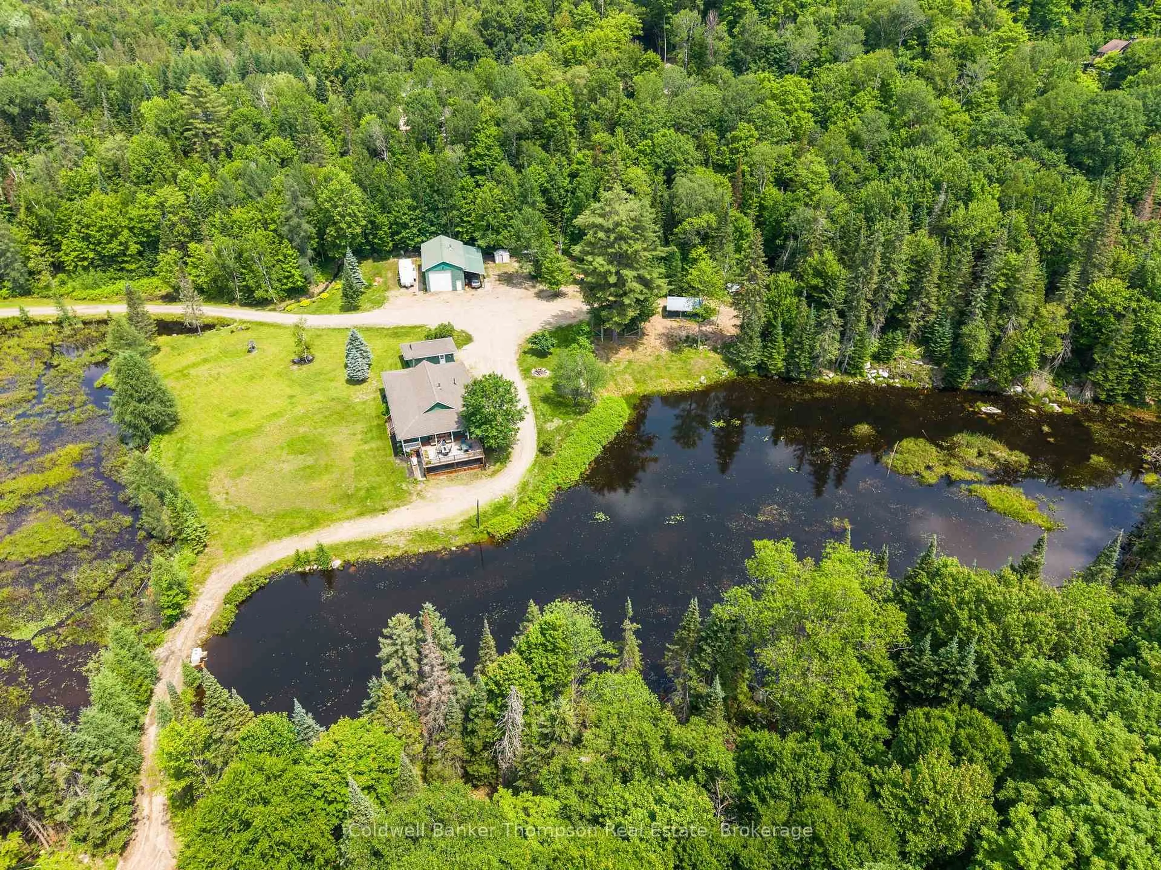 A pic from outside/outdoor area/front of a property/back of a property/a pic from drone, water/lake/river/ocean view for 448 Long Lake Rd, Perry Ontario P0A 1R0