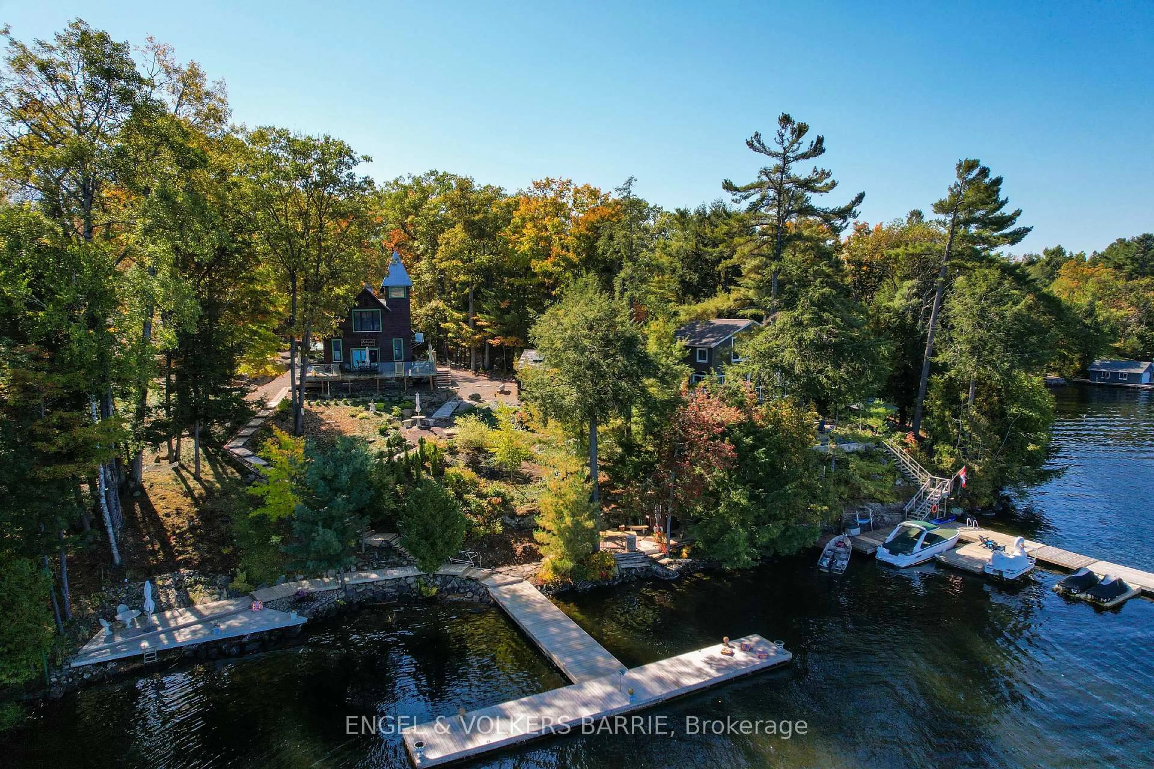 A pic from outside/outdoor area/front of a property/back of a property/a pic from drone, water/lake/river/ocean view for 1669 Walkers Pt Rd, Muskoka Lakes Ontario P1P 1R2