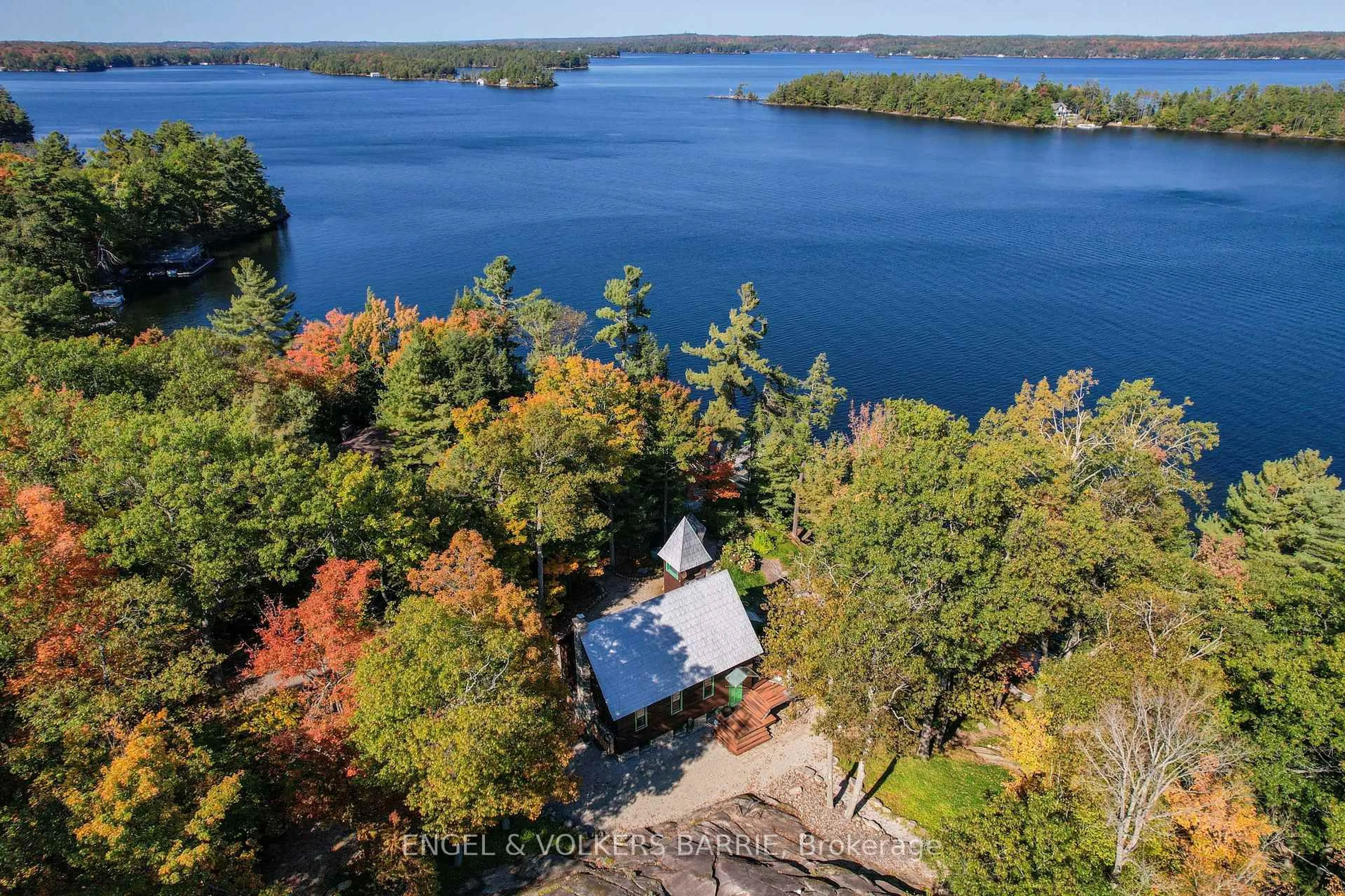 A pic from outside/outdoor area/front of a property/back of a property/a pic from drone, water/lake/river/ocean view for 1669 Walkers Pt Rd, Muskoka Lakes Ontario P1P 1R2