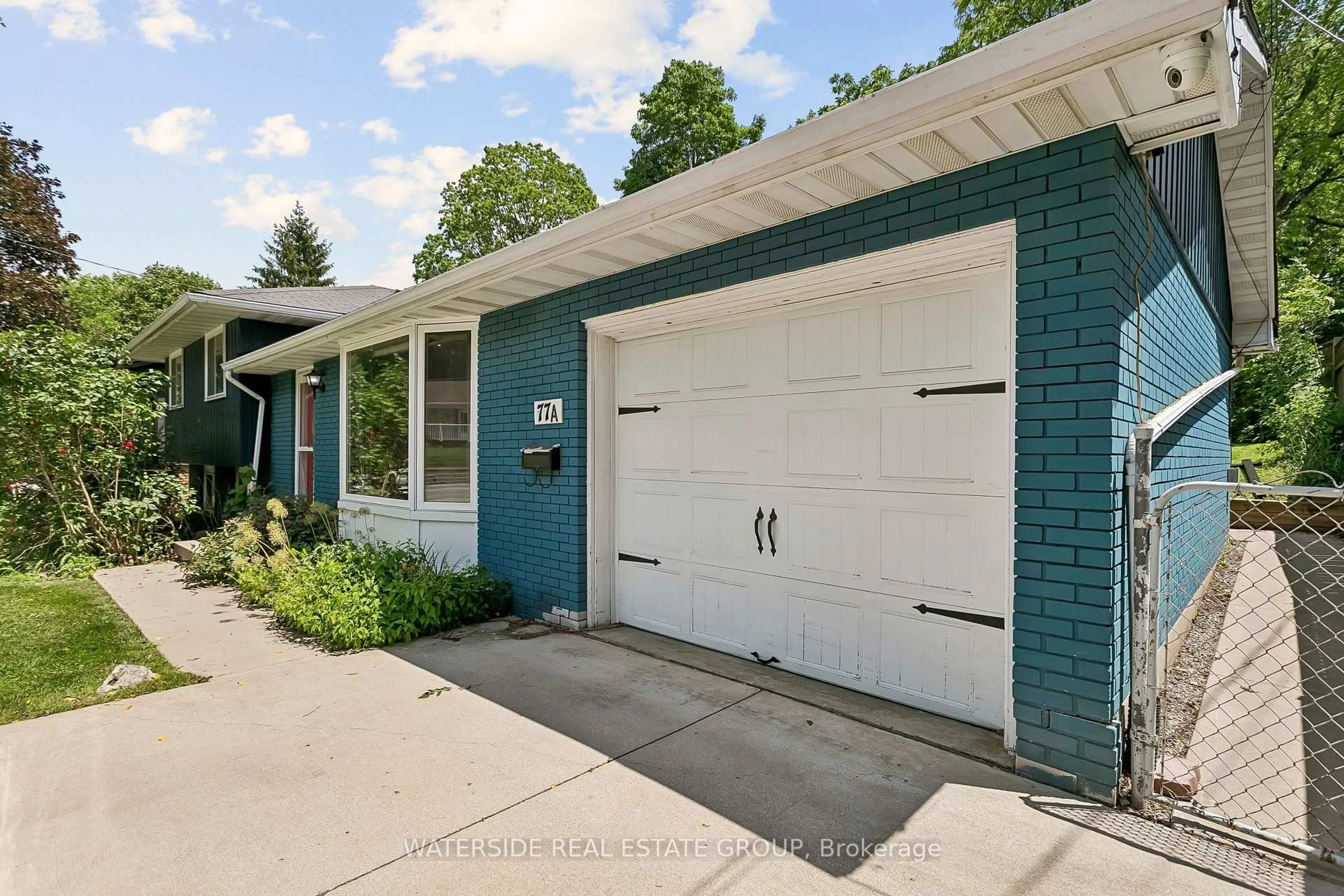 Home with brick exterior material, street for 77A Creighton Rd, Hamilton Ontario L9H 3B7