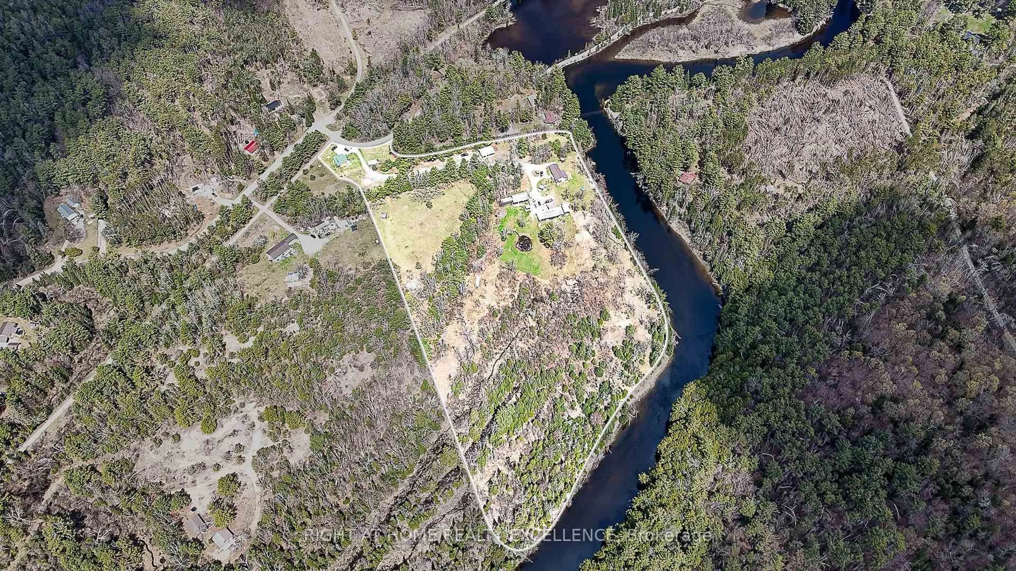 A pic from outside/outdoor area/front of a property/back of a property/a pic from drone, water/lake/river/ocean view for 1246 Howland Junction Rd, Minden Hills Ontario K0M 2A1