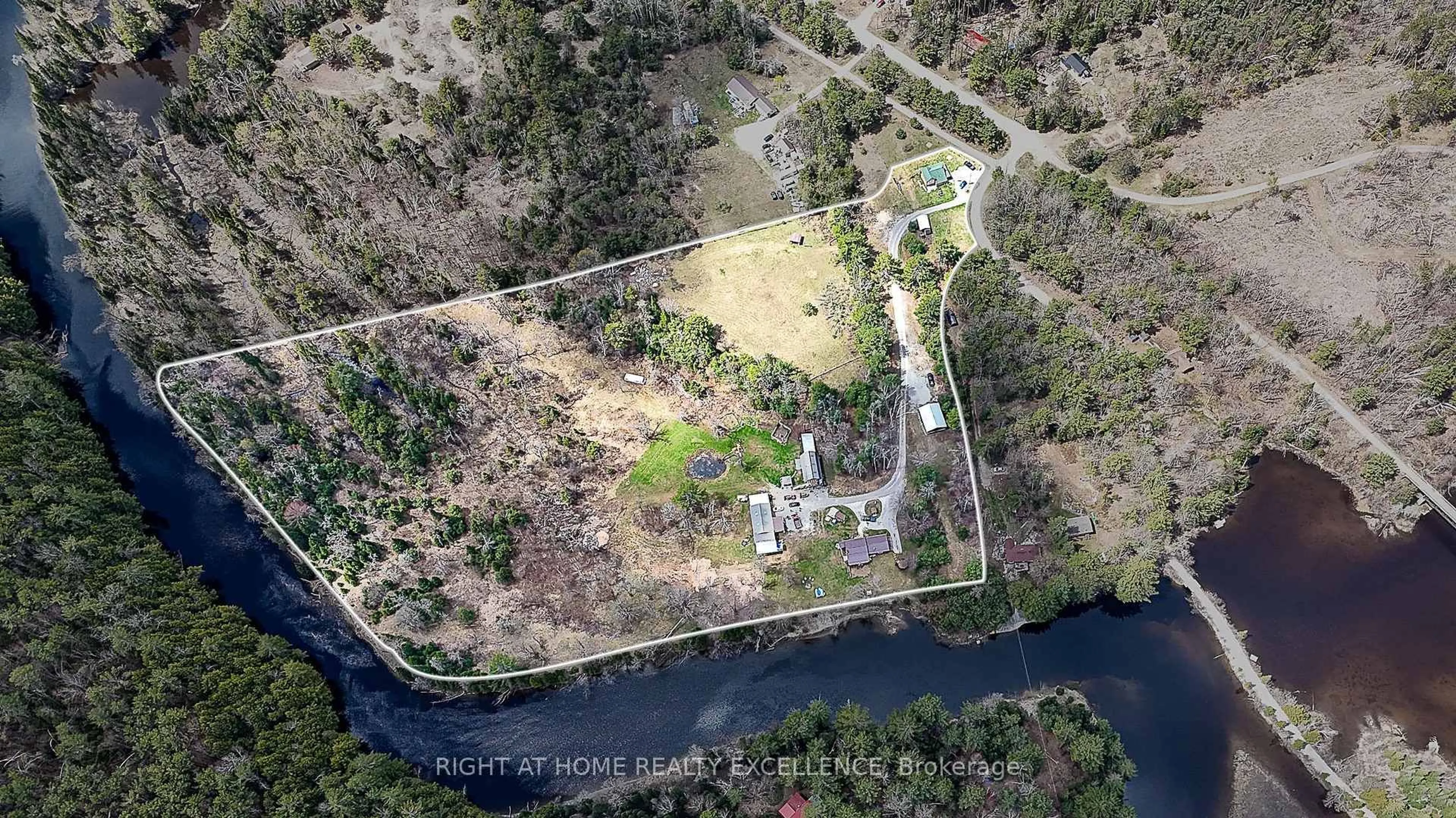A pic from outside/outdoor area/front of a property/back of a property/a pic from drone, water/lake/river/ocean view for 1246 Howland Junction Rd, Minden Hills Ontario K0M 2A1