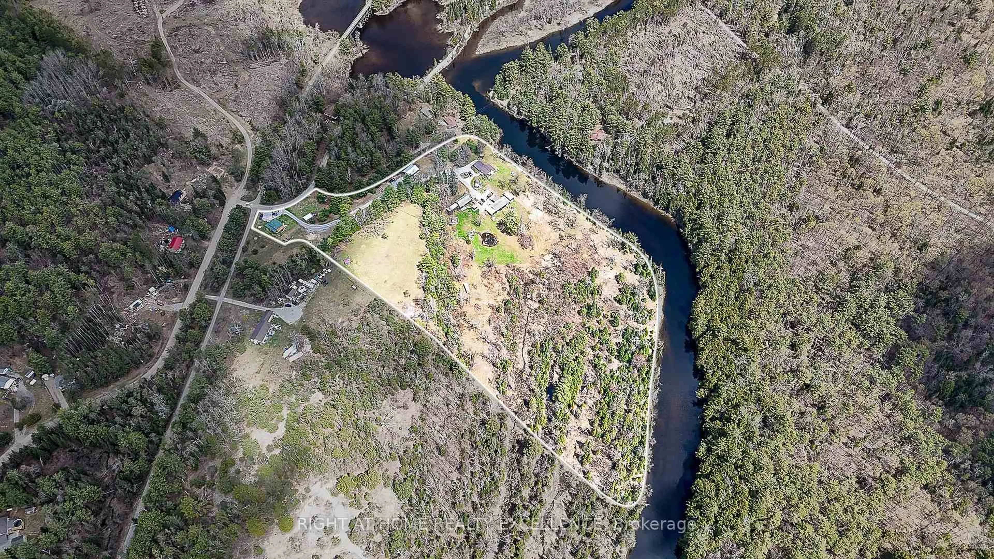 A pic from outside/outdoor area/front of a property/back of a property/a pic from drone, water/lake/river/ocean view for 1234 Howland Junction Rd, Minden Hills Ontario K0M 2A1