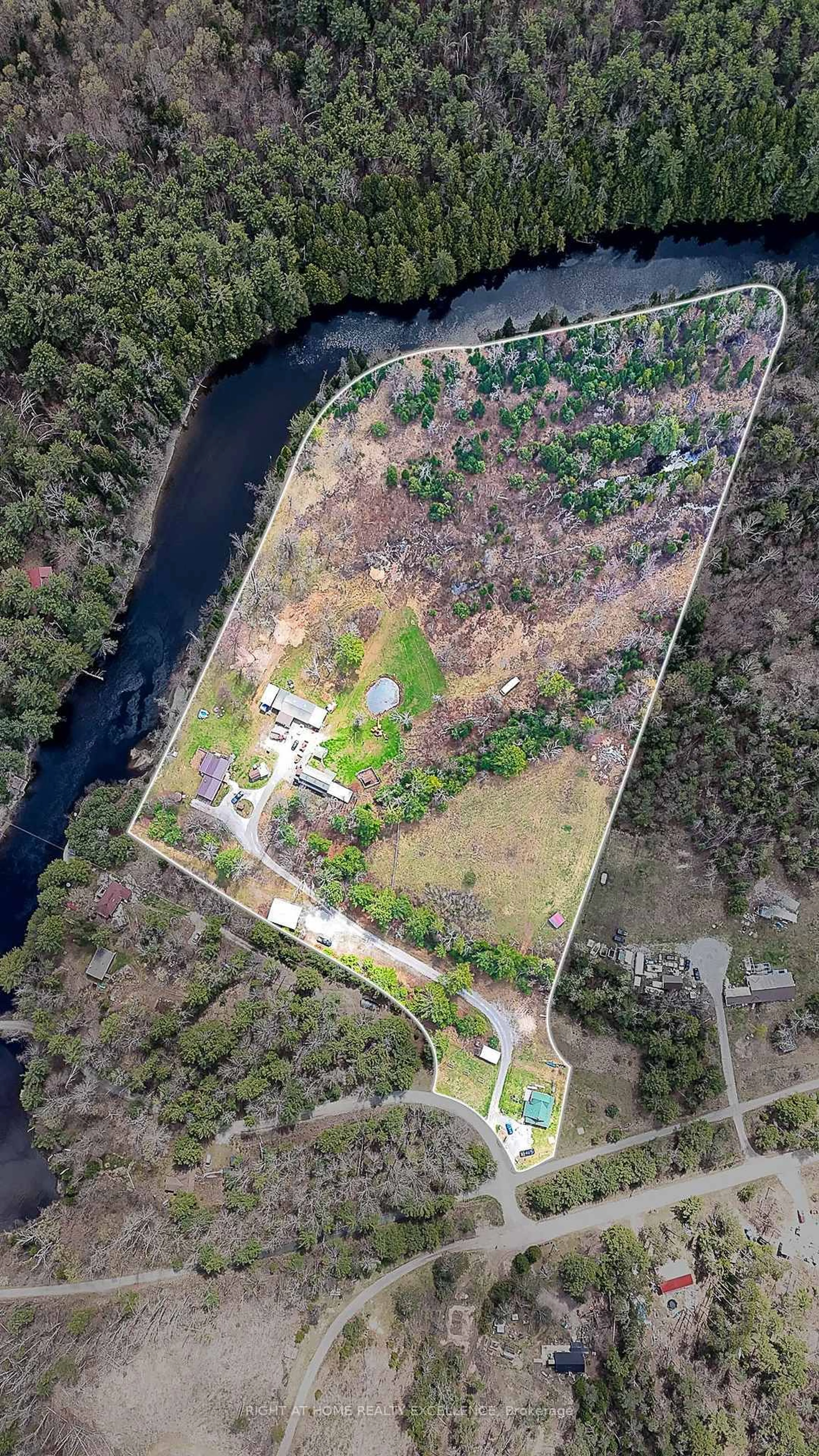 A pic from outside/outdoor area/front of a property/back of a property/a pic from drone, water/lake/river/ocean view for 1234 Howland Junction Rd, Minden Hills Ontario K0M 2A1