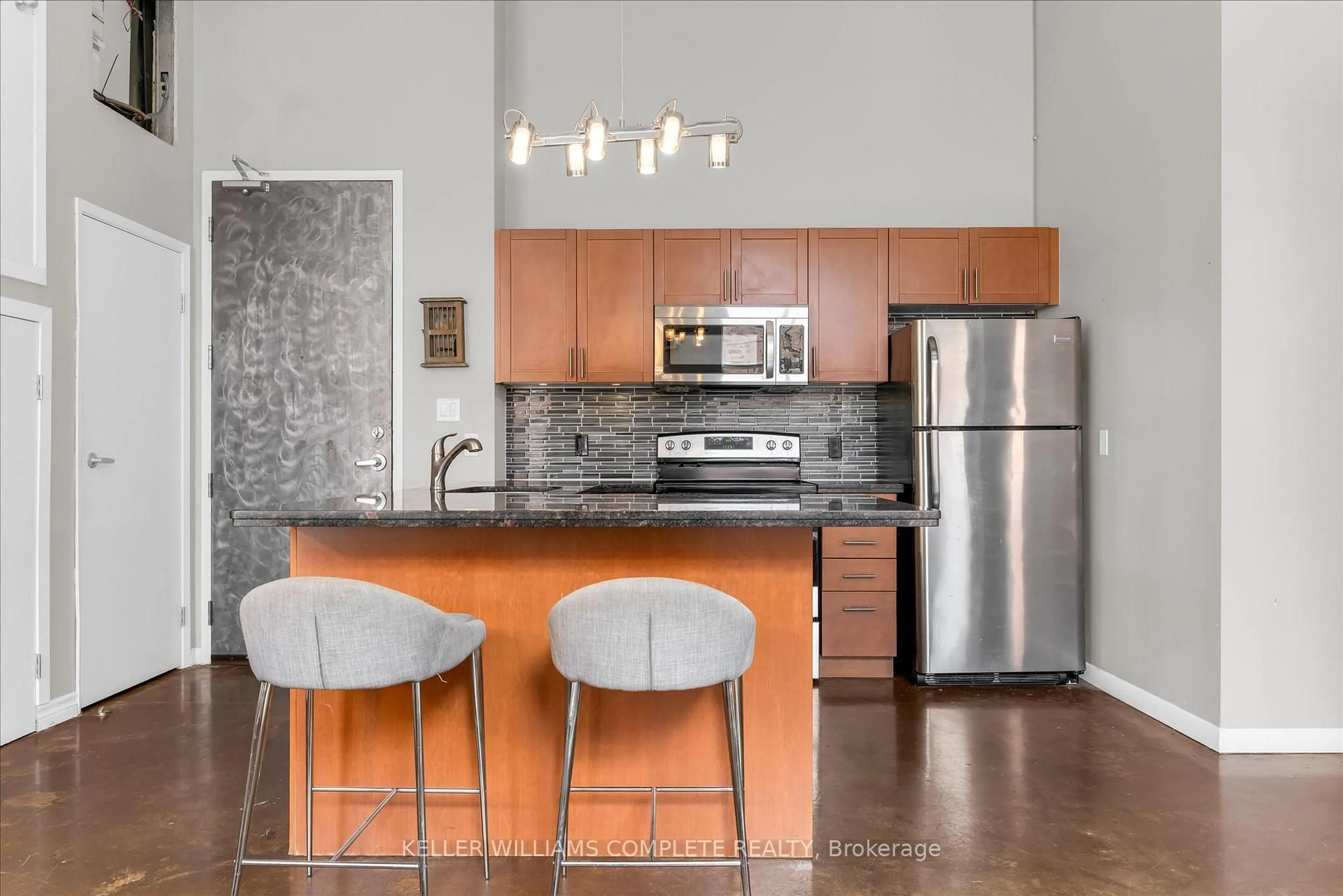 Open concept kitchen, unknown for 11 Rebecca St #208, Hamilton Ontario L8R 3H7