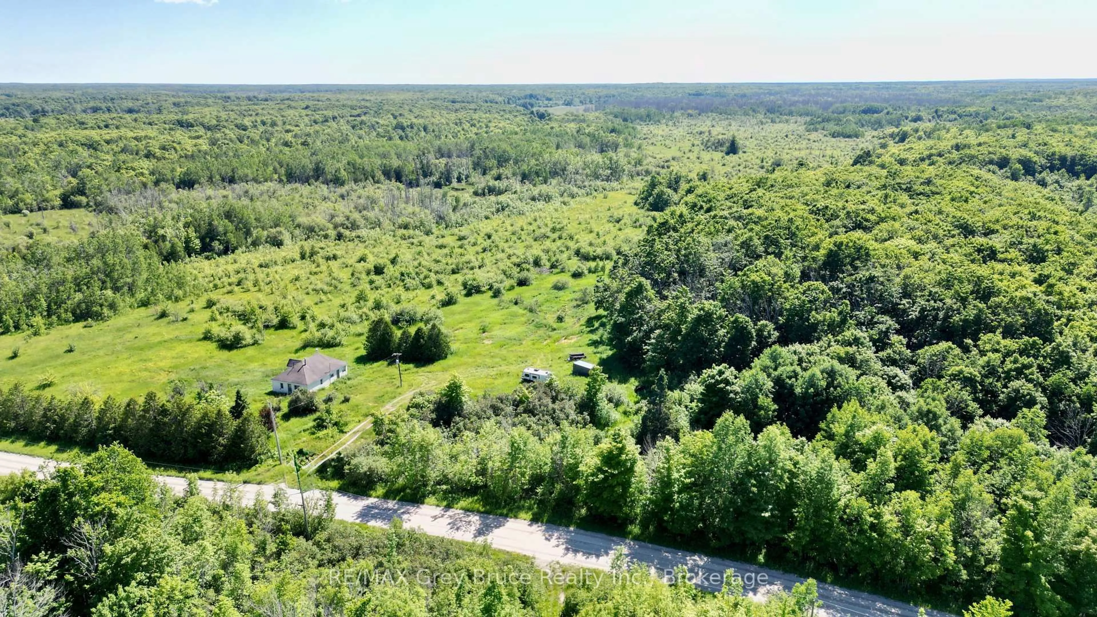 A pic from outside/outdoor area/front of a property/back of a property/a pic from drone, forest/trees view for 151 BARTLEY Dr, Northern Bruce Peninsula Ontario N0H 1W0