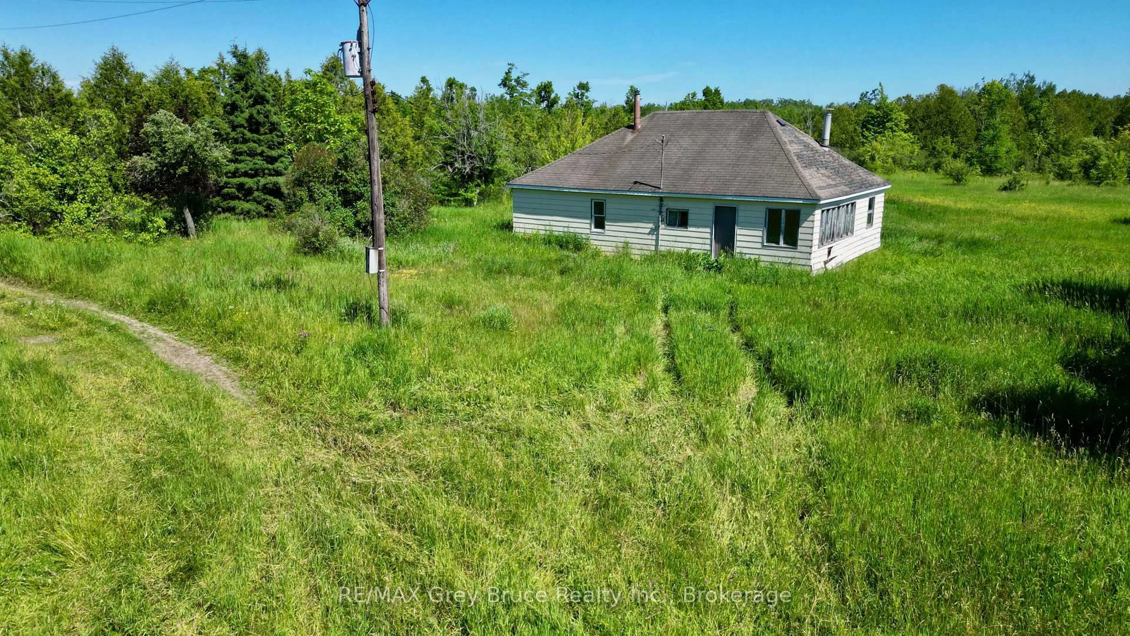 A pic from outside/outdoor area/front of a property/back of a property/a pic from drone, building for 151 BARTLEY Dr, Northern Bruce Peninsula Ontario N0H 1W0