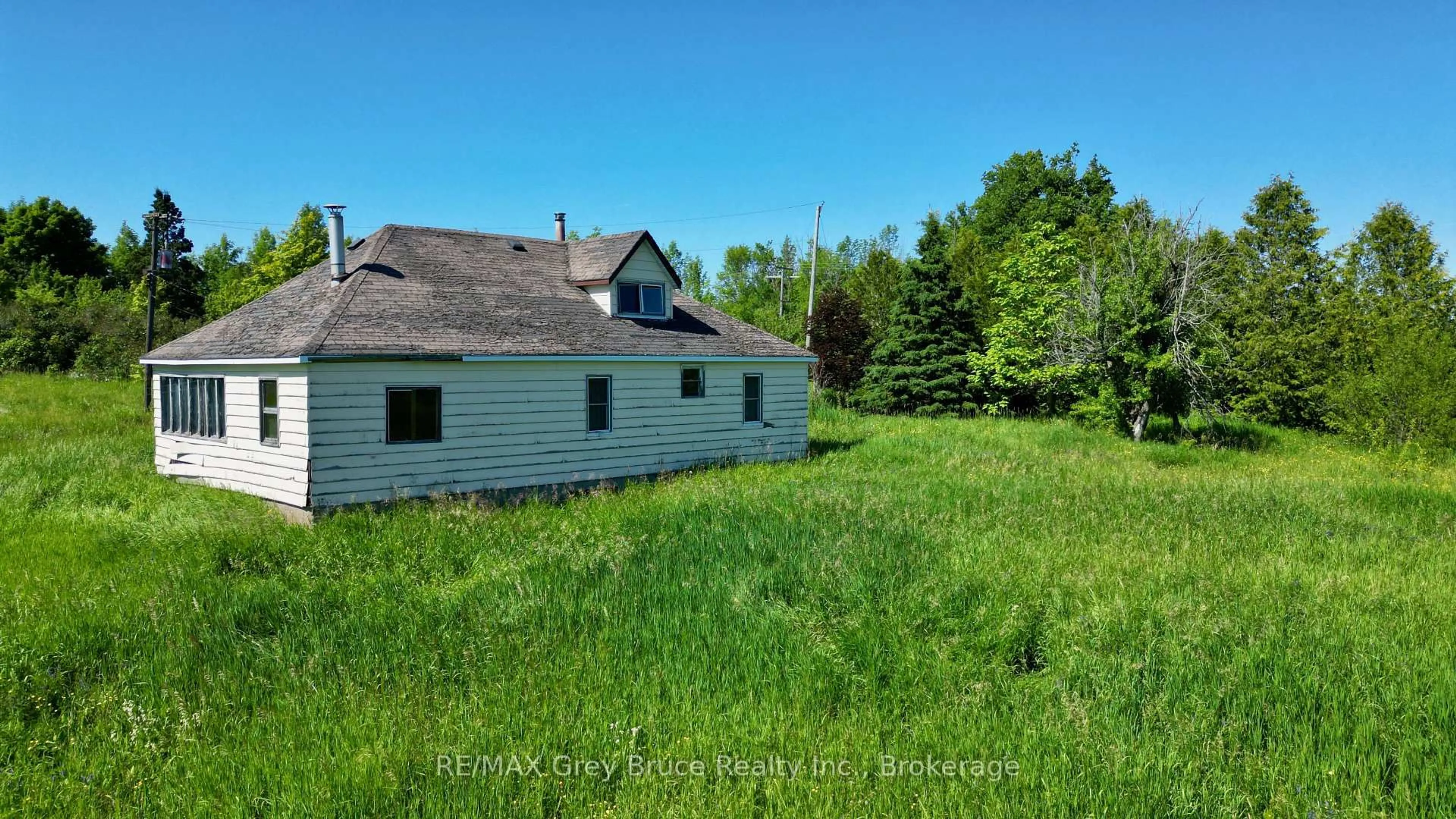 A pic from outside/outdoor area/front of a property/back of a property/a pic from drone, building for 151 BARTLEY Dr, Northern Bruce Peninsula Ontario N0H 1W0