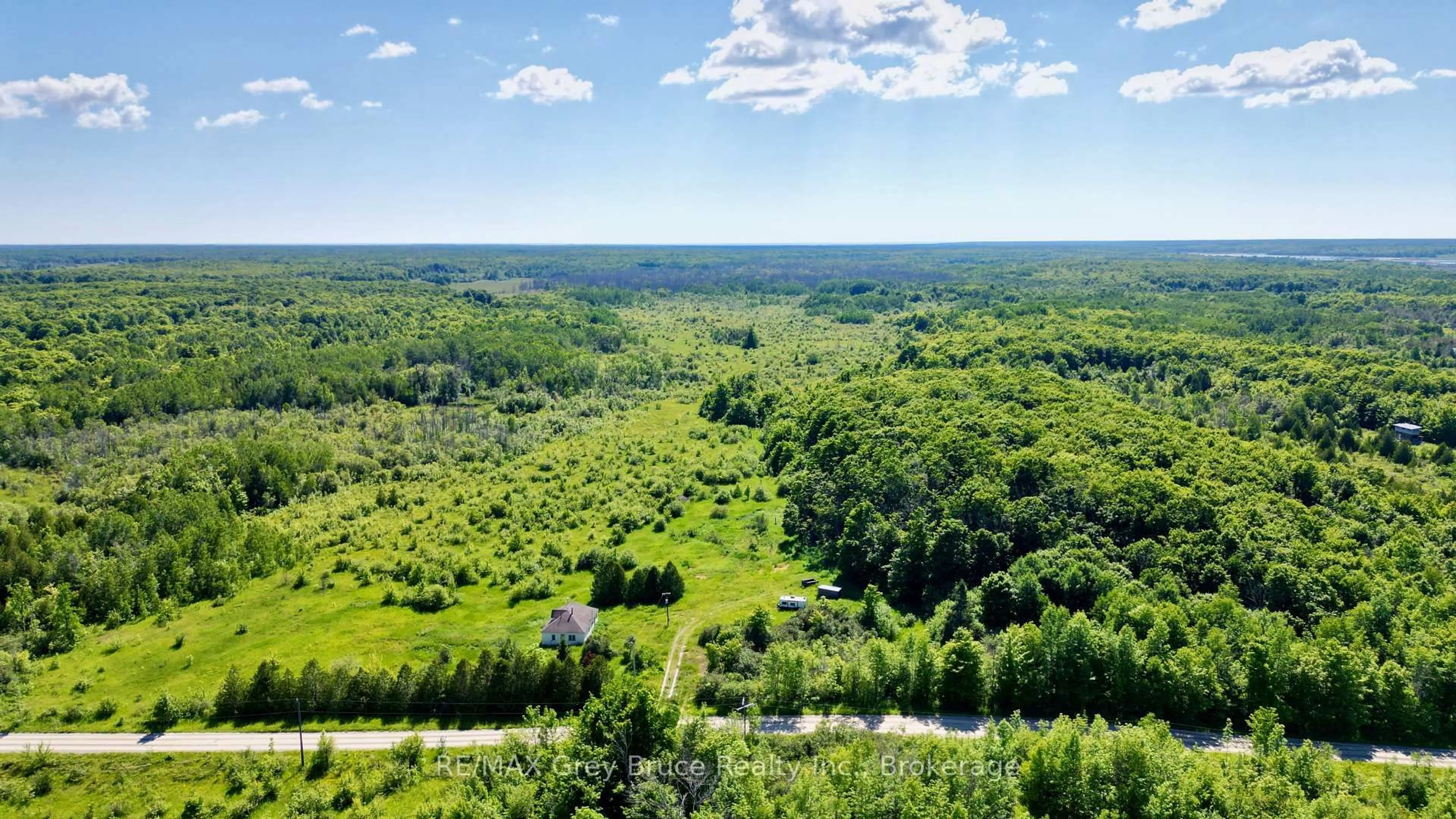 A pic from outside/outdoor area/front of a property/back of a property/a pic from drone, forest/trees view for 151 BARTLEY Dr, Northern Bruce Peninsula Ontario N0H 1W0