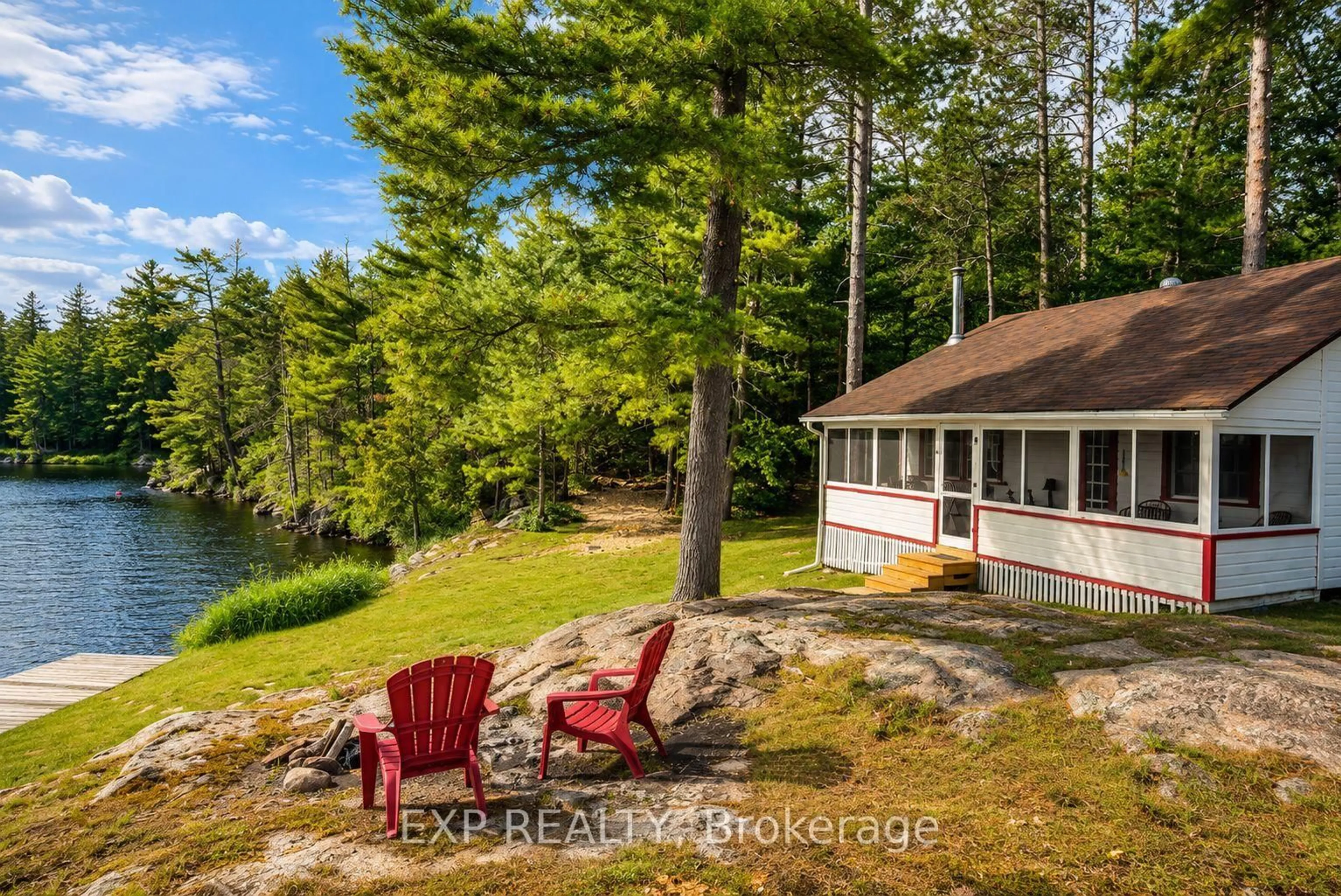 A pic from outside/outdoor area/front of a property/back of a property/a pic from drone, water/lake/river/ocean view for 7594 Severn River Shore, Georgian Bay Ontario L0K 1E0