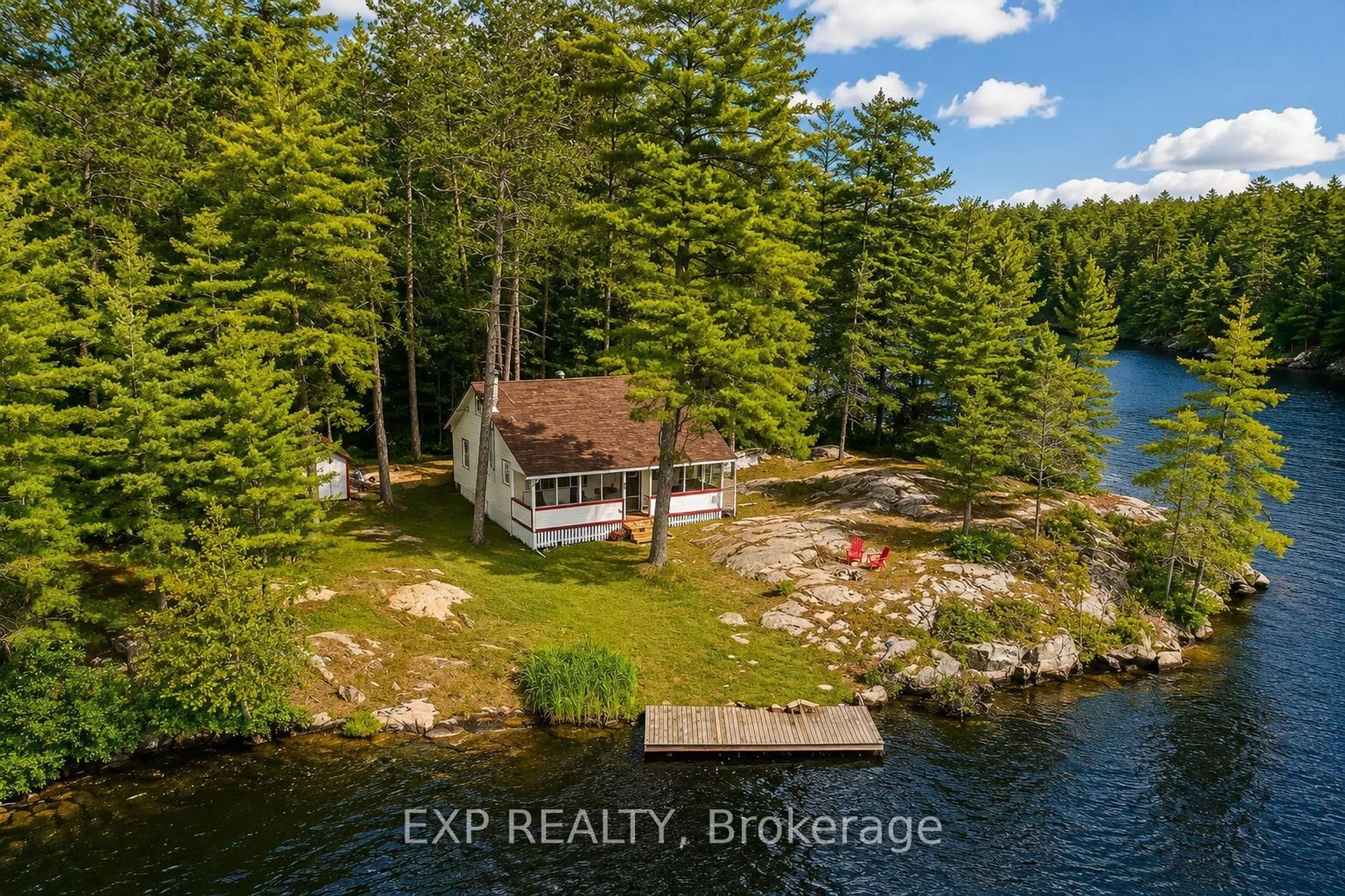 A pic from outside/outdoor area/front of a property/back of a property/a pic from drone, water/lake/river/ocean view for 7594 Severn River Shore, Georgian Bay Ontario L0K 1E0