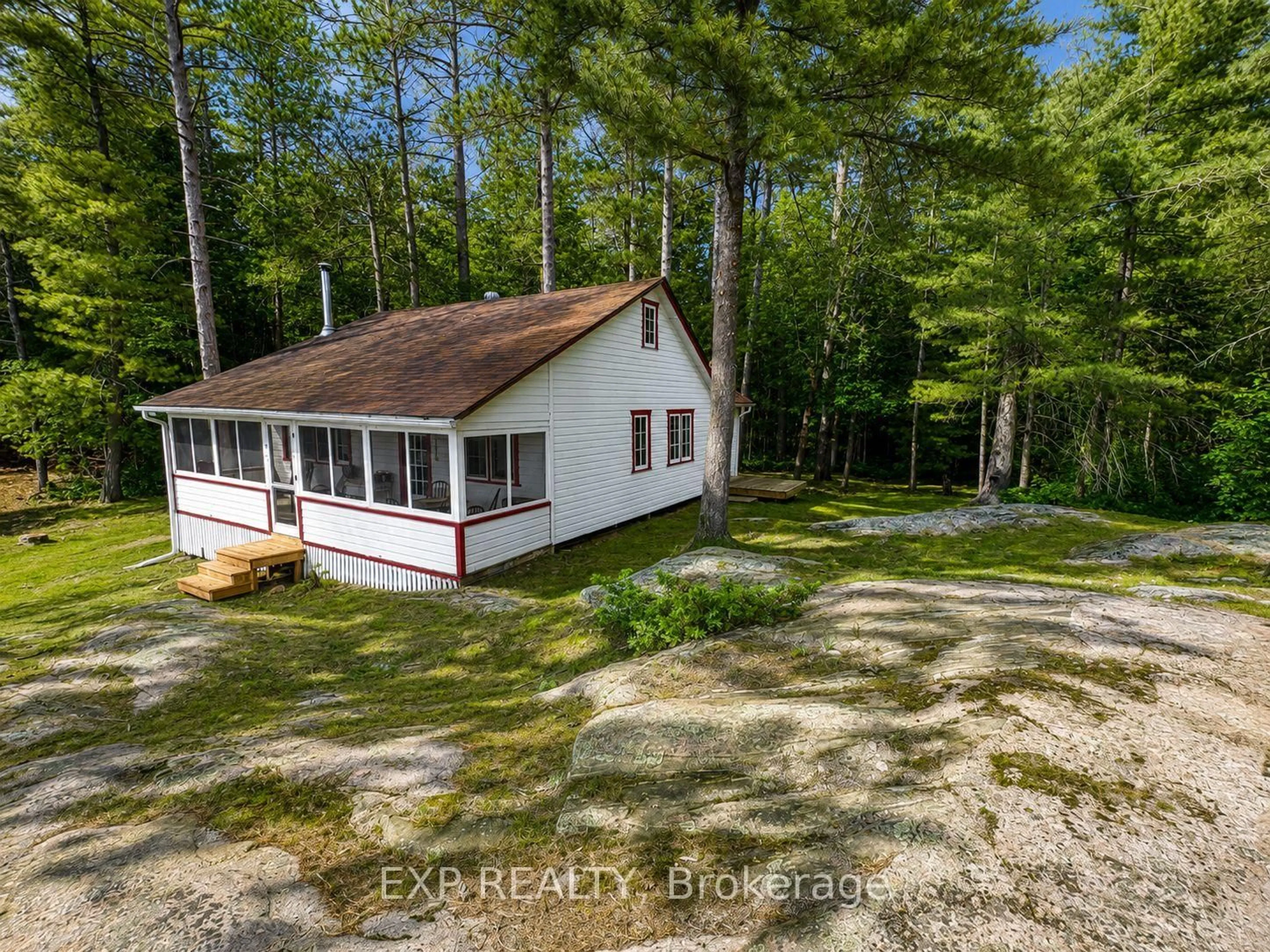 A pic from outside/outdoor area/front of a property/back of a property/a pic from drone, water/lake/river/ocean view for 7594 Severn River Shore, Georgian Bay Ontario L0K 1E0