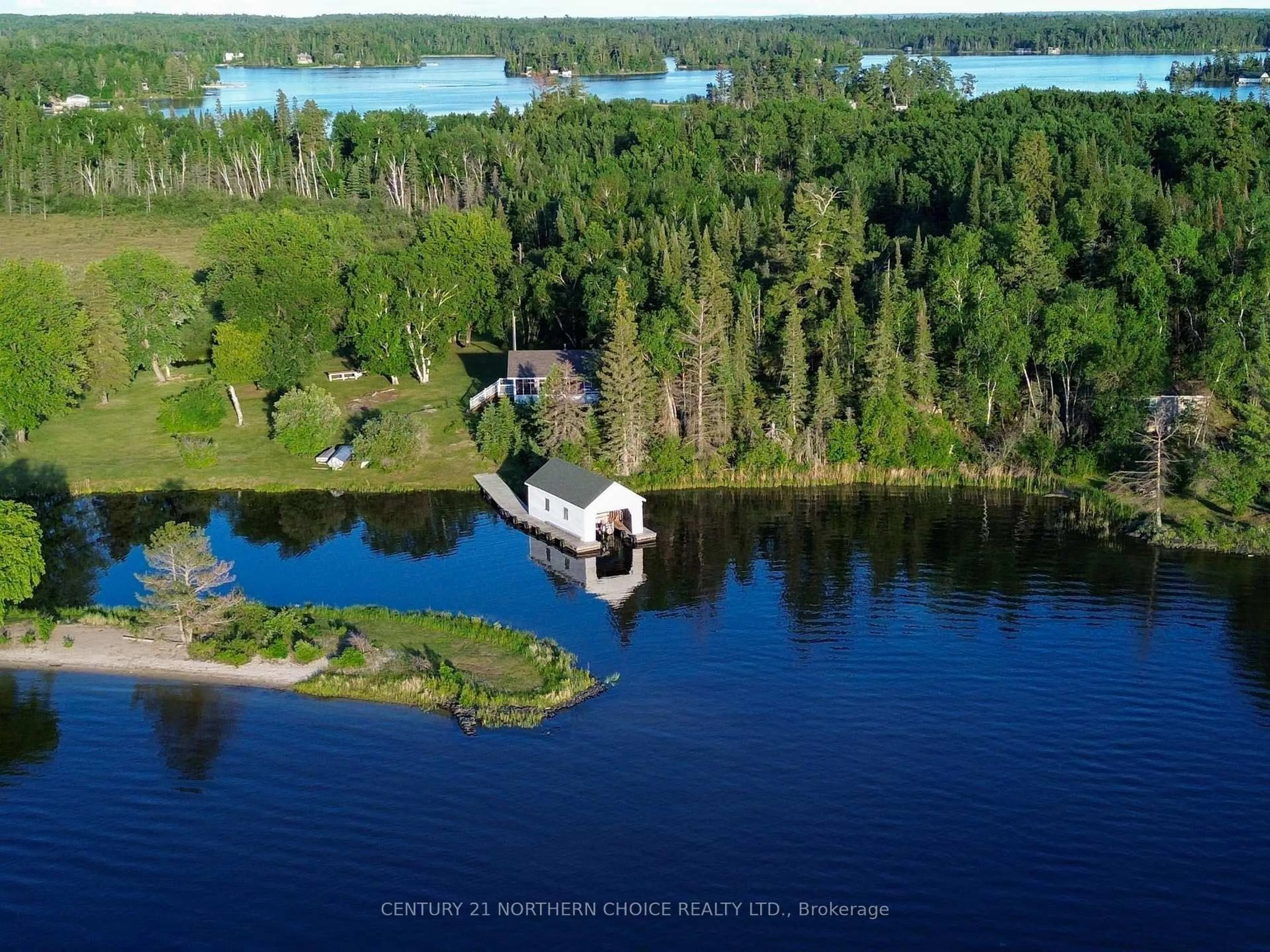 A pic from outside/outdoor area/front of a property/back of a property/a pic from drone, water/lake/river/ocean view for 440 Coney Island, Kenora Ontario P9N 3X4