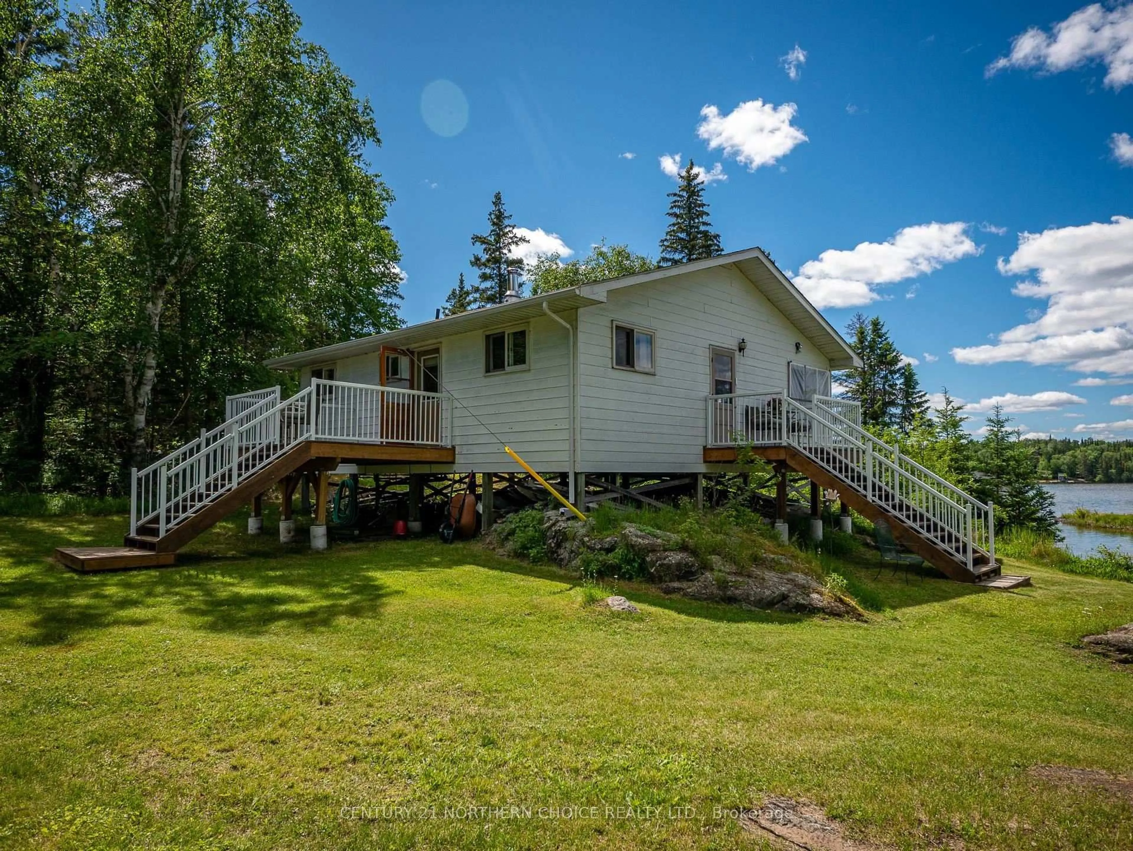 A pic from outside/outdoor area/front of a property/back of a property/a pic from drone, unknown for 440 Coney Island, Kenora Ontario P9N 3X4