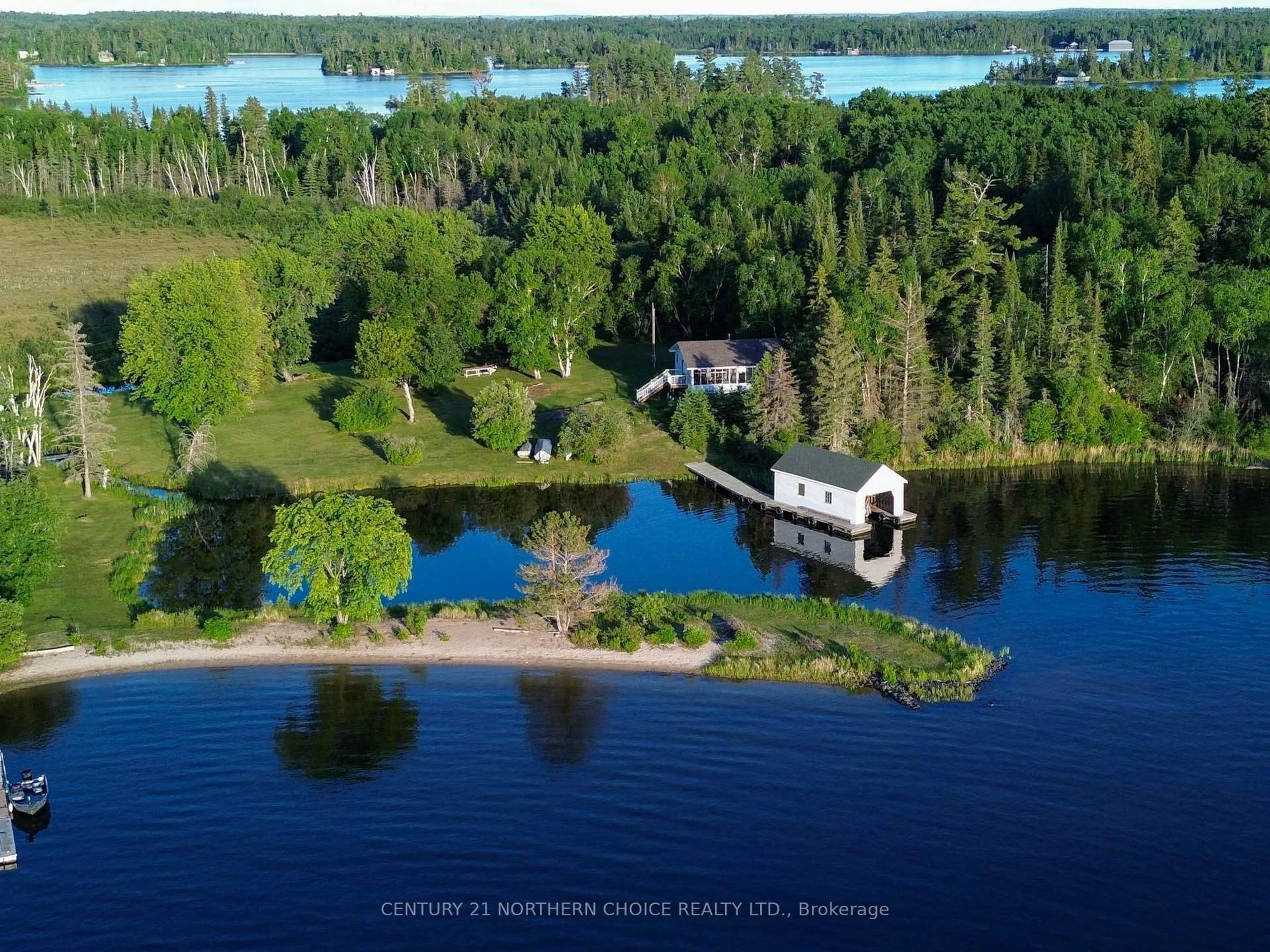 A pic from outside/outdoor area/front of a property/back of a property/a pic from drone, water/lake/river/ocean view for 440 Coney Island, Kenora Ontario P9N 3X4