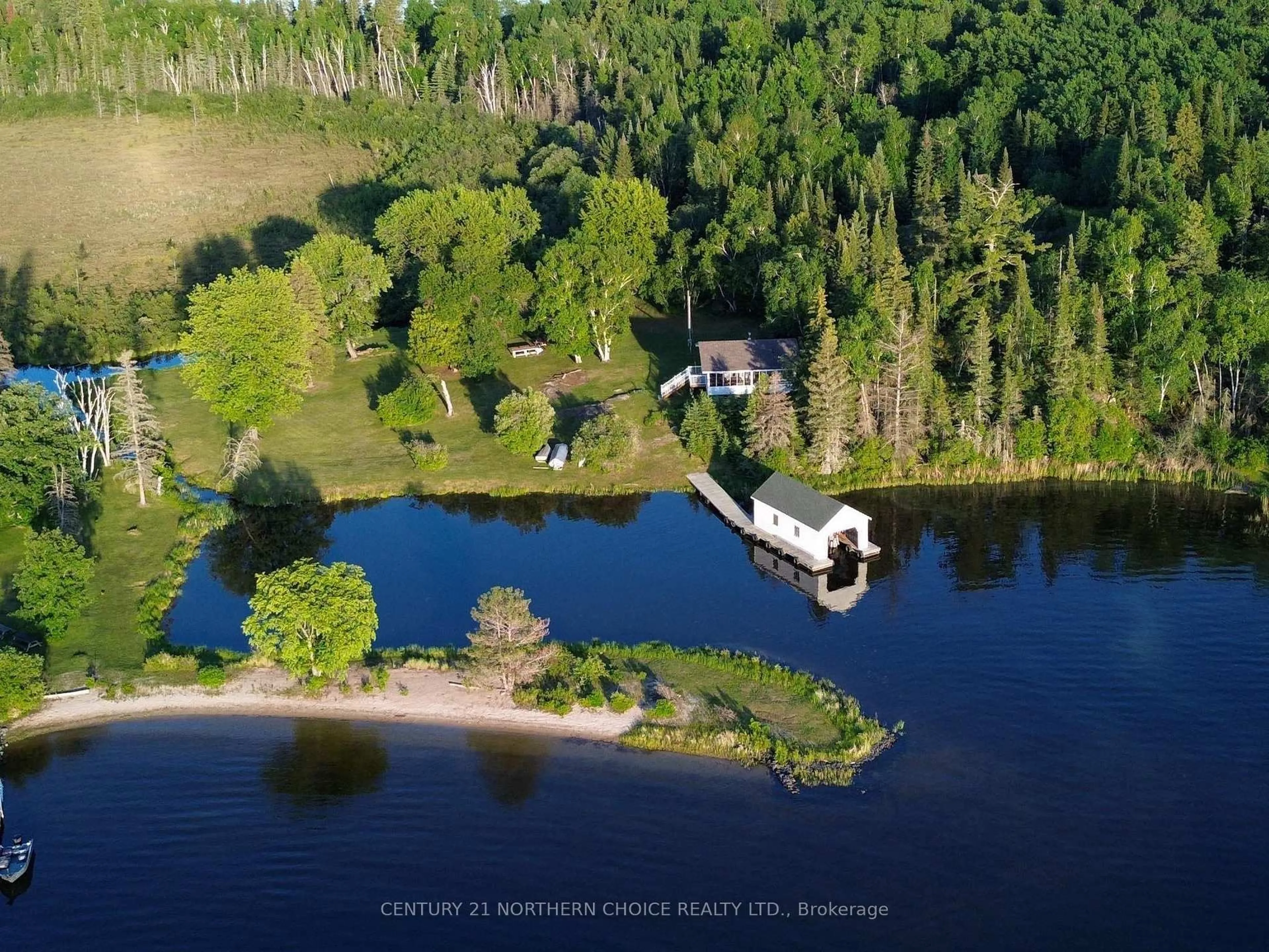 A pic from outside/outdoor area/front of a property/back of a property/a pic from drone, water/lake/river/ocean view for 440 Coney Island, Kenora Ontario P9N 3X4