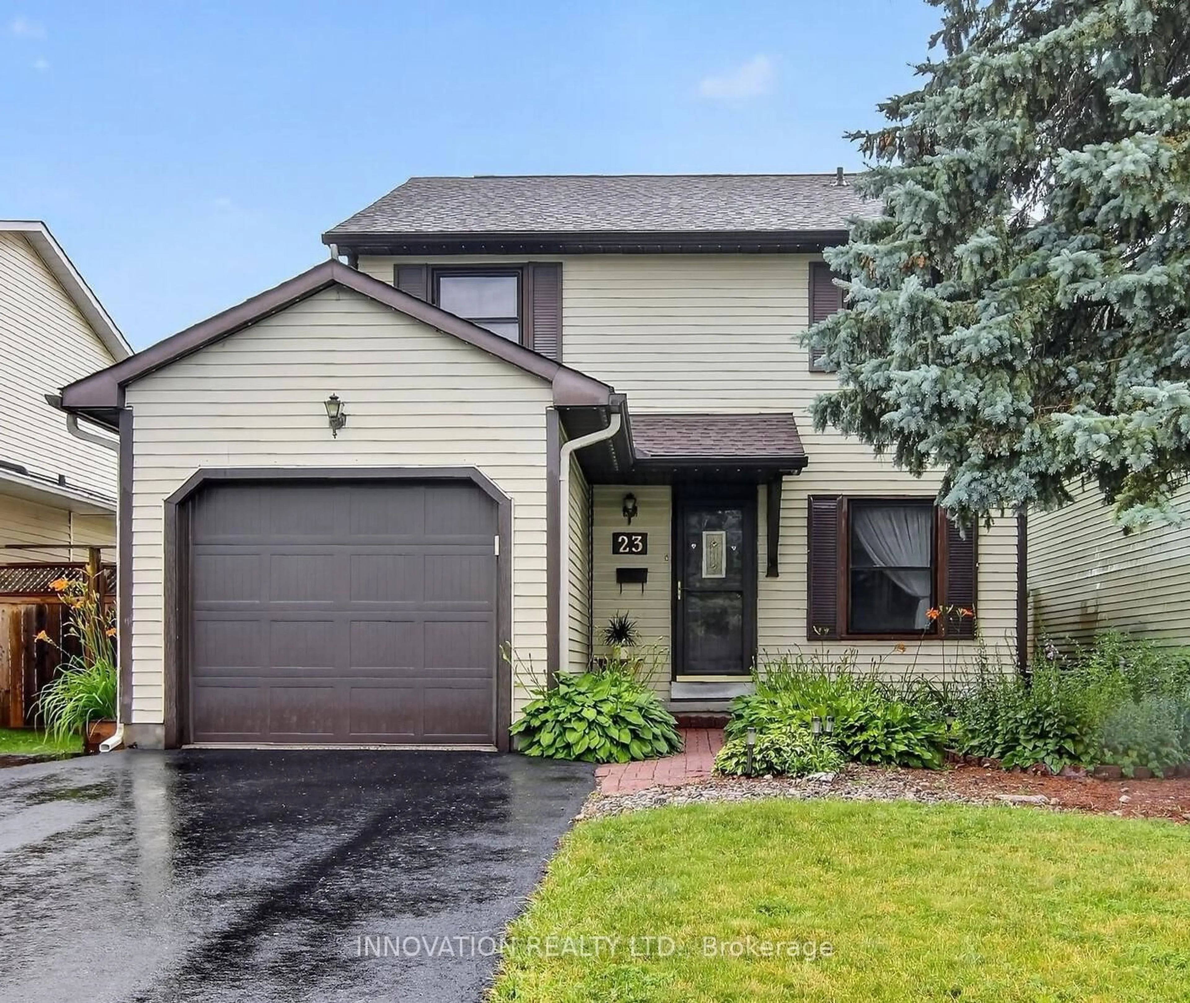 Home with vinyl exterior material, street for 23 McKitrick Dr, Ottawa Ontario K2L 2J7