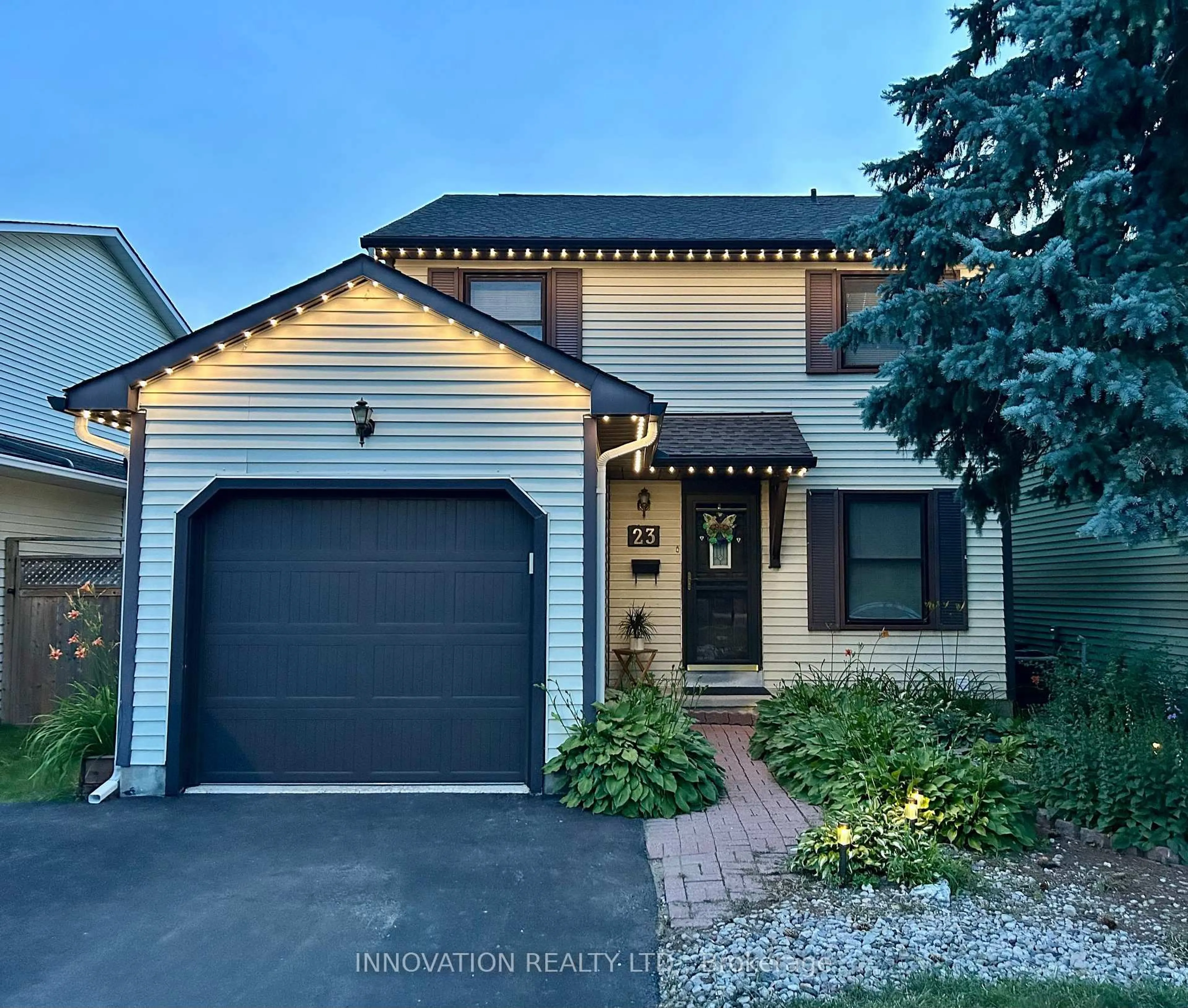 Home with vinyl exterior material, street for 23 McKitrick Dr, Ottawa Ontario K2L 2J7
