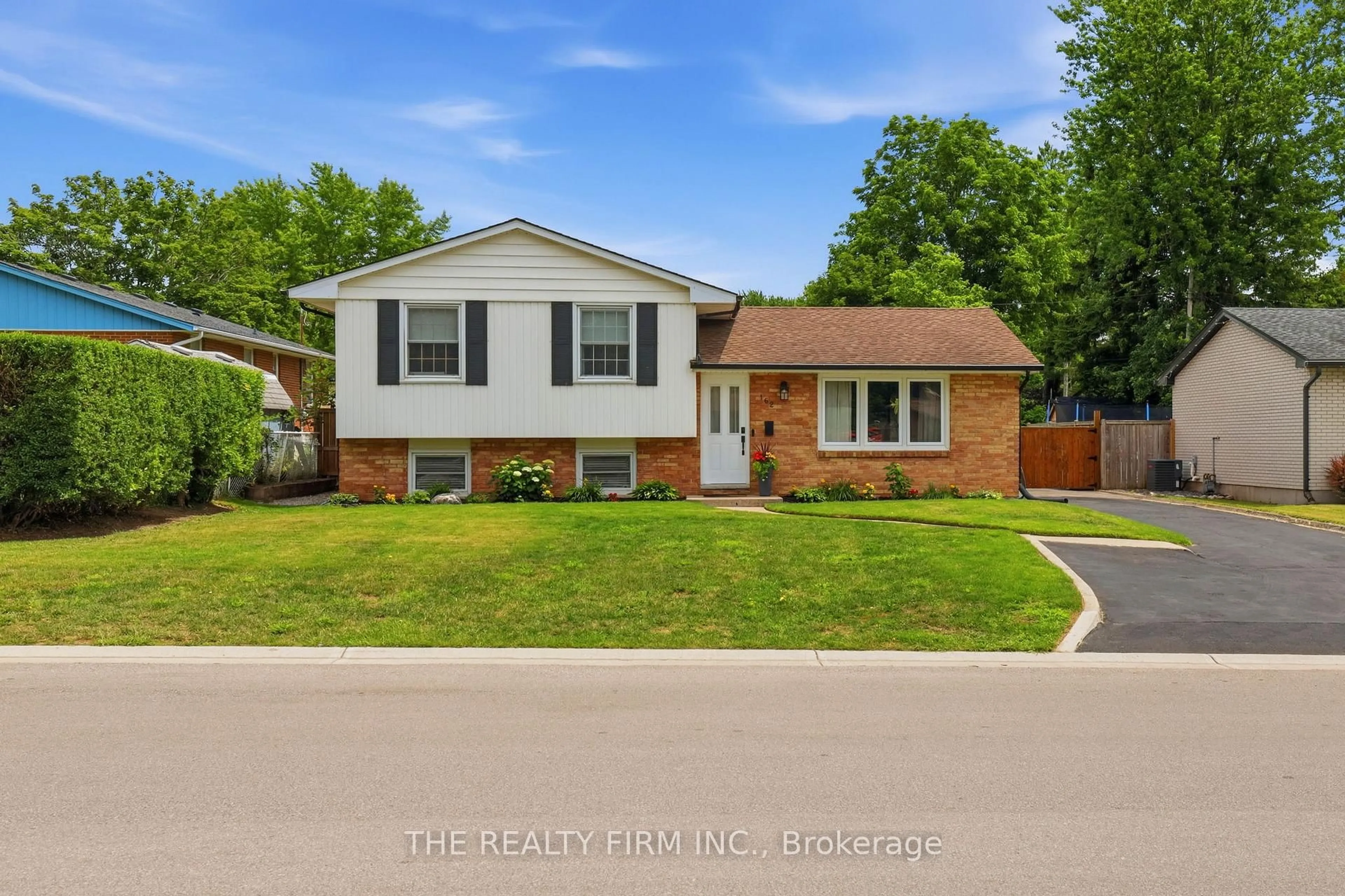 Home with brick exterior material, street for 162 Oakwood Dr, Thames Centre Ontario N0L 1G3