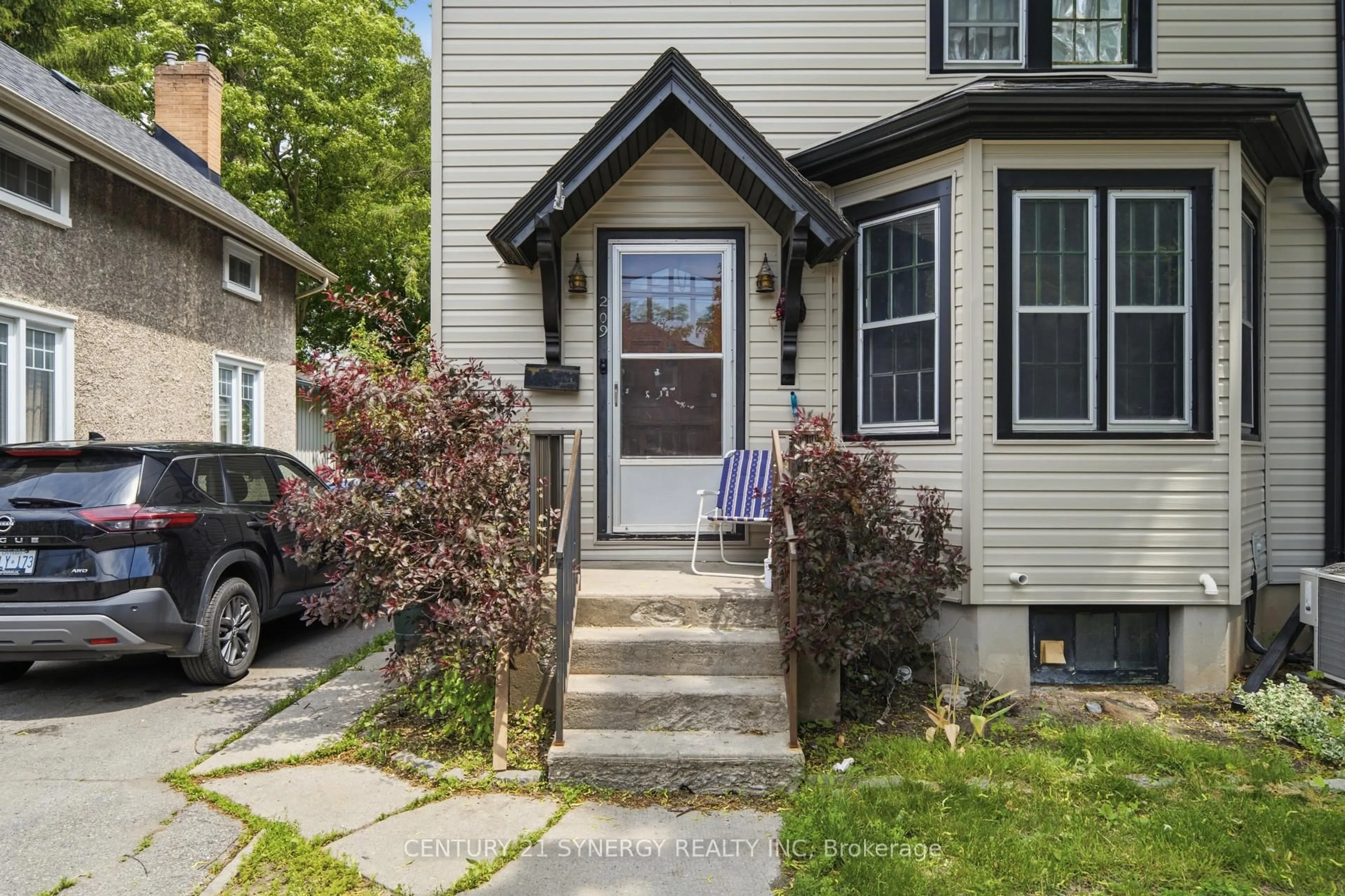 Home with vinyl exterior material, street for 207-209 Foster Ave, Belleville Ontario K8N 3R1