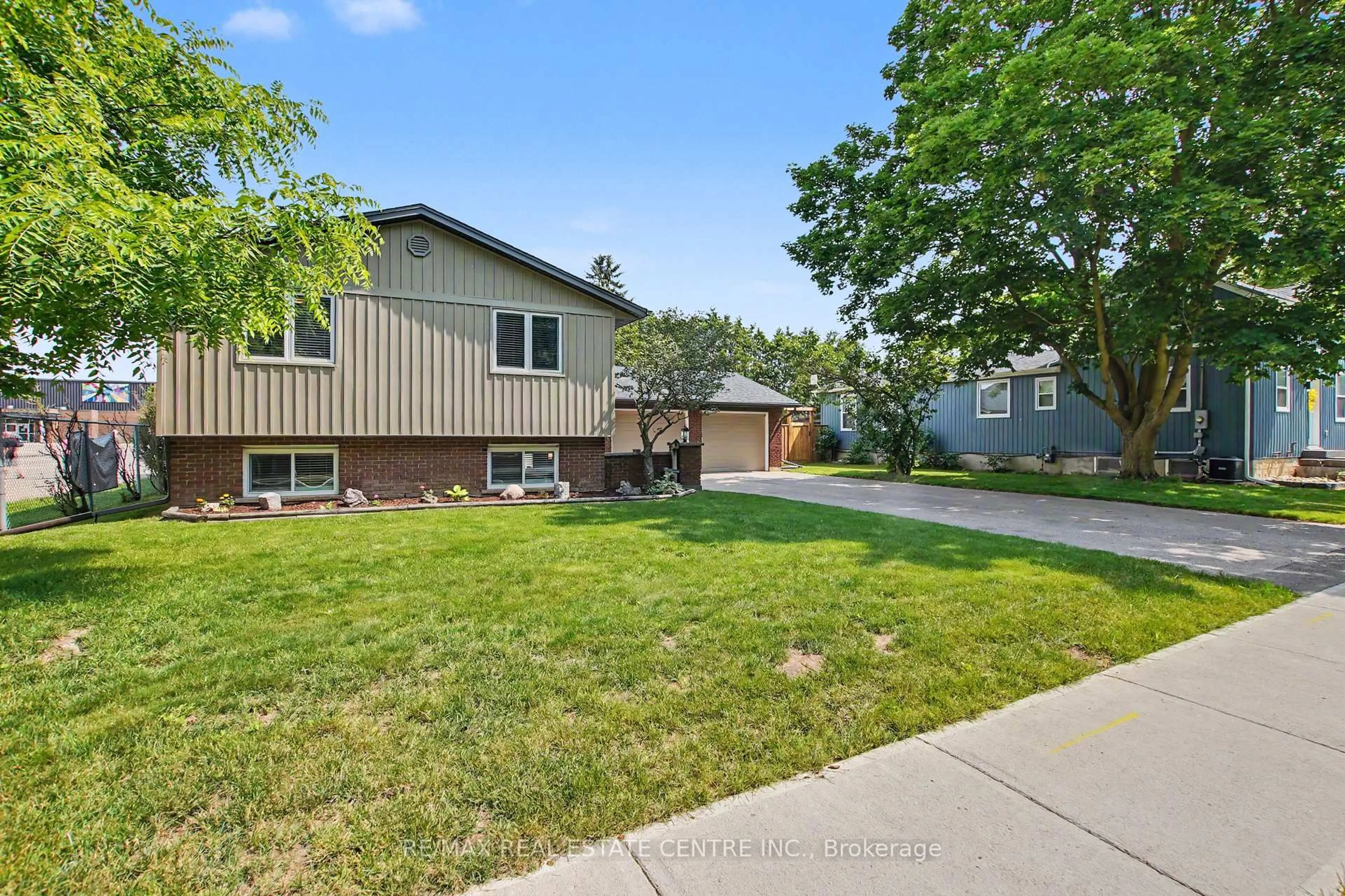 Home with vinyl exterior material, street for 1045 Queens Bush Rd, Wellesley Ontario N0B 2T0