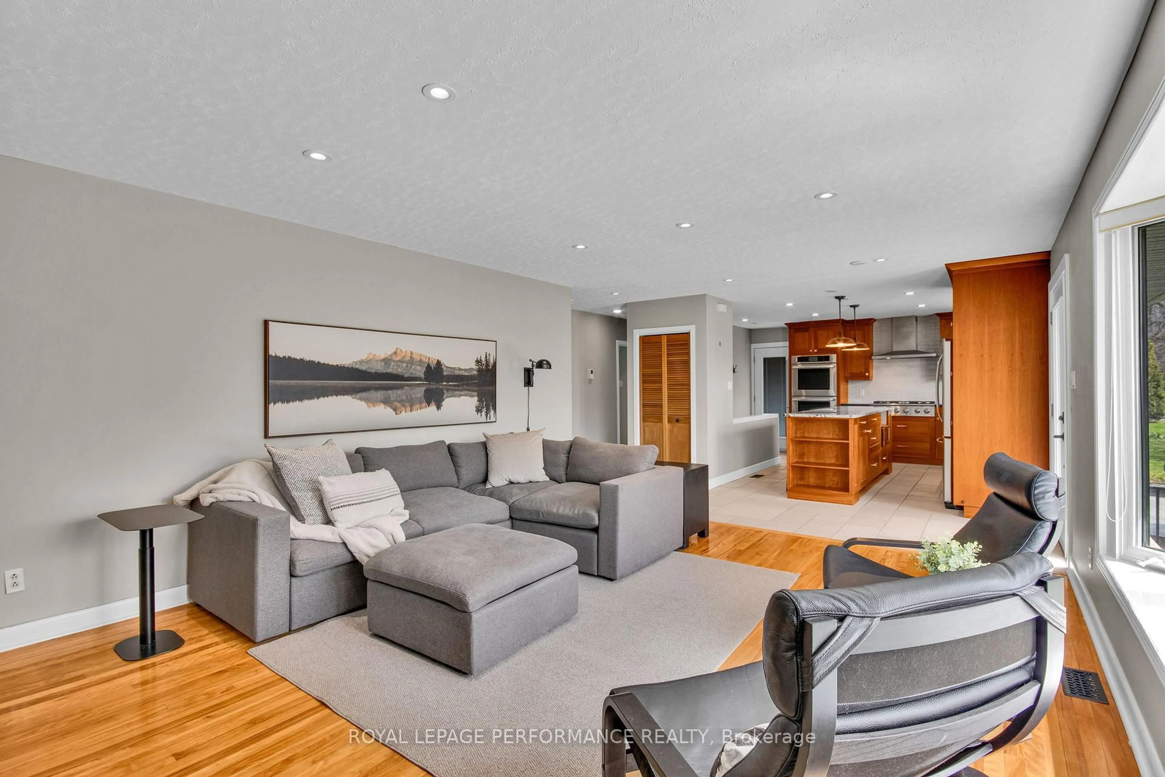 Living room with furniture, unknown for 1321 Rustic Dr, Ottawa Ontario K2C 2Y3
